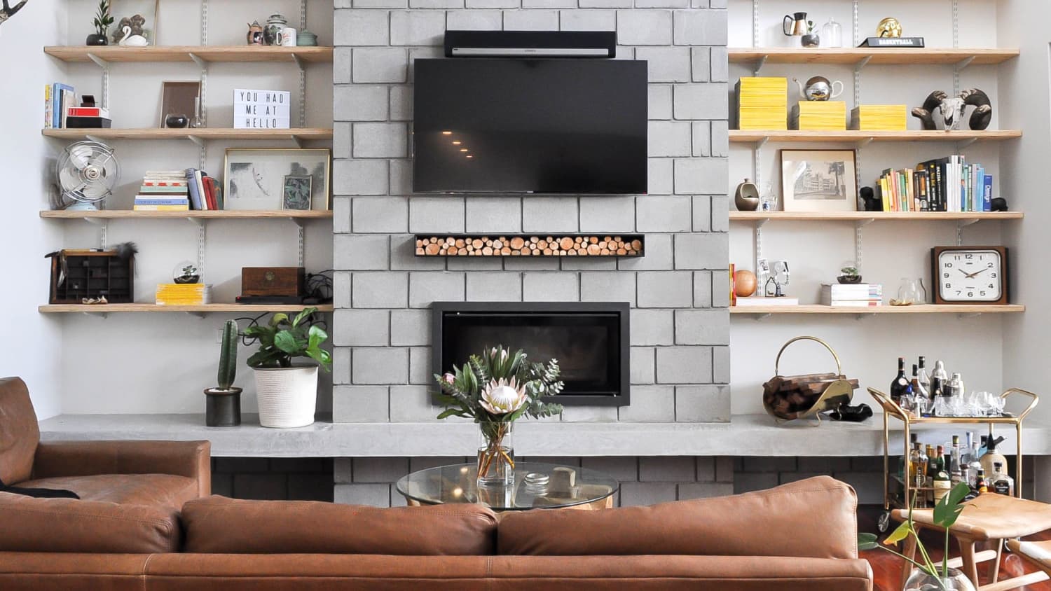 Tv stand store above fireplace