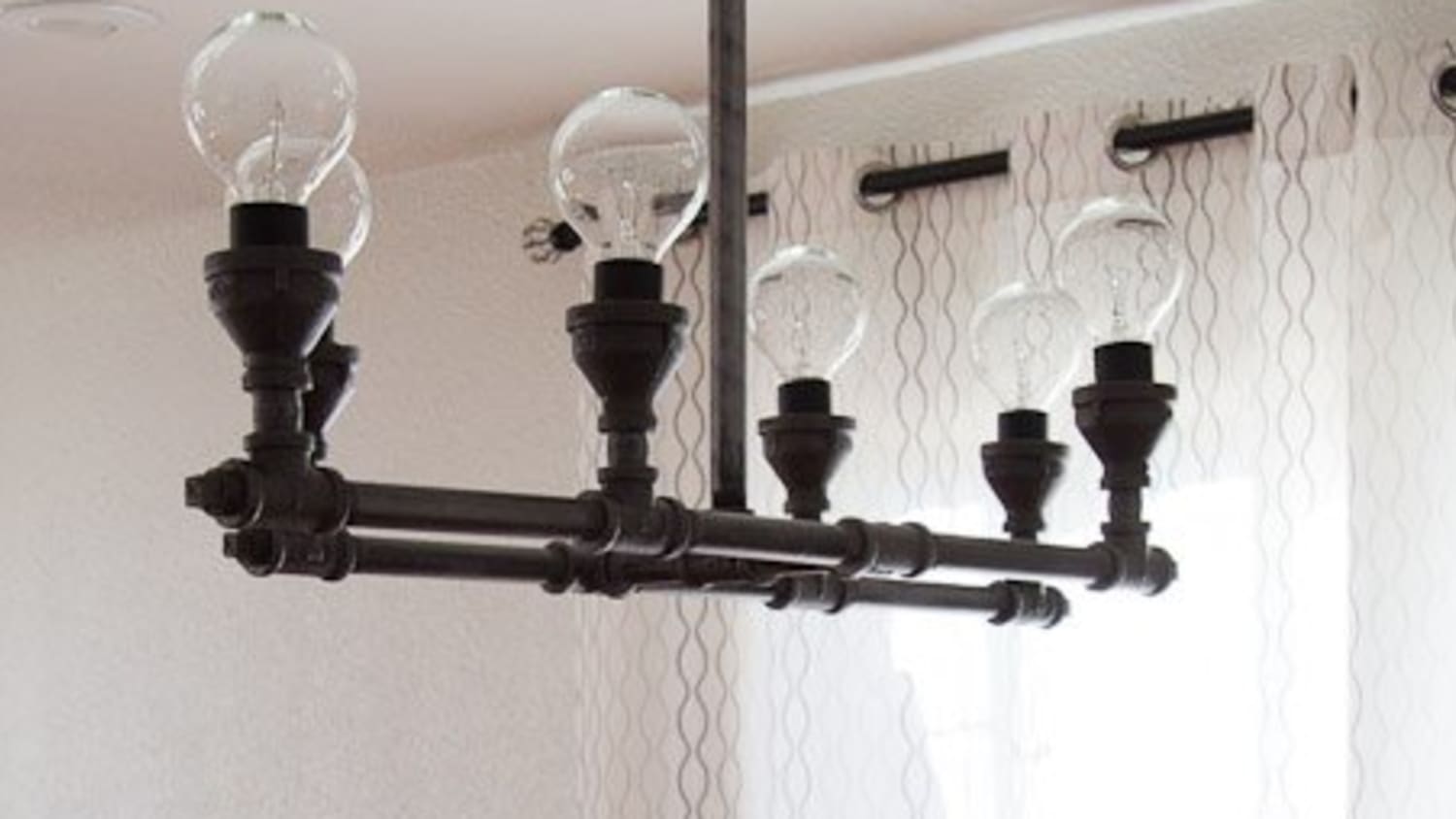 Steel pipe outlet light fixture