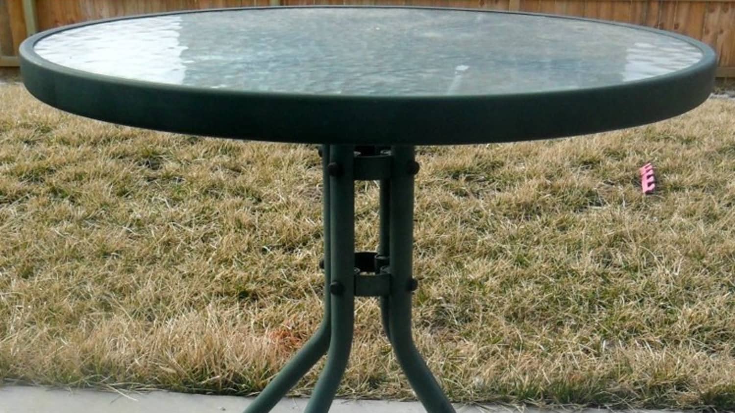 Oval glass hotsell patio table