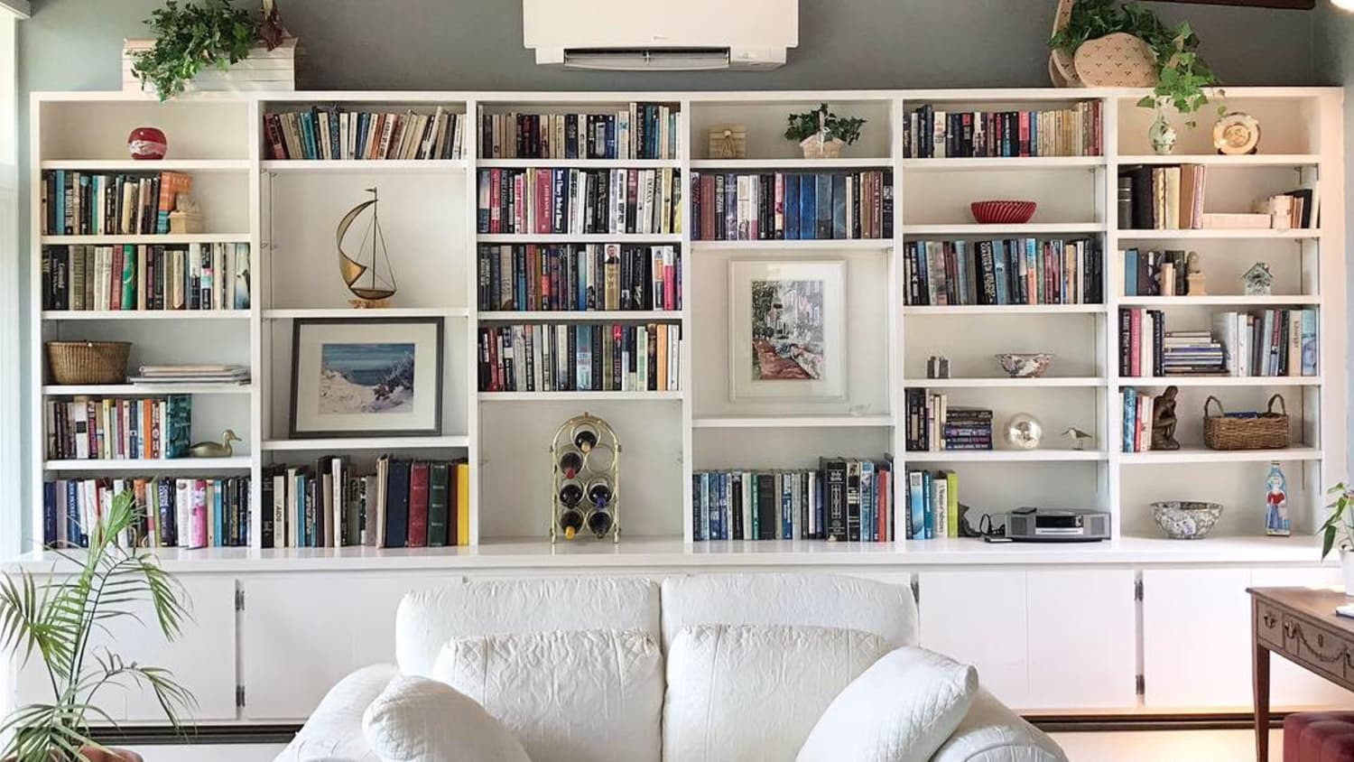 Before and After A Bold Living Room Bookshelf Transformation for Less than 100 Apartment Therapy