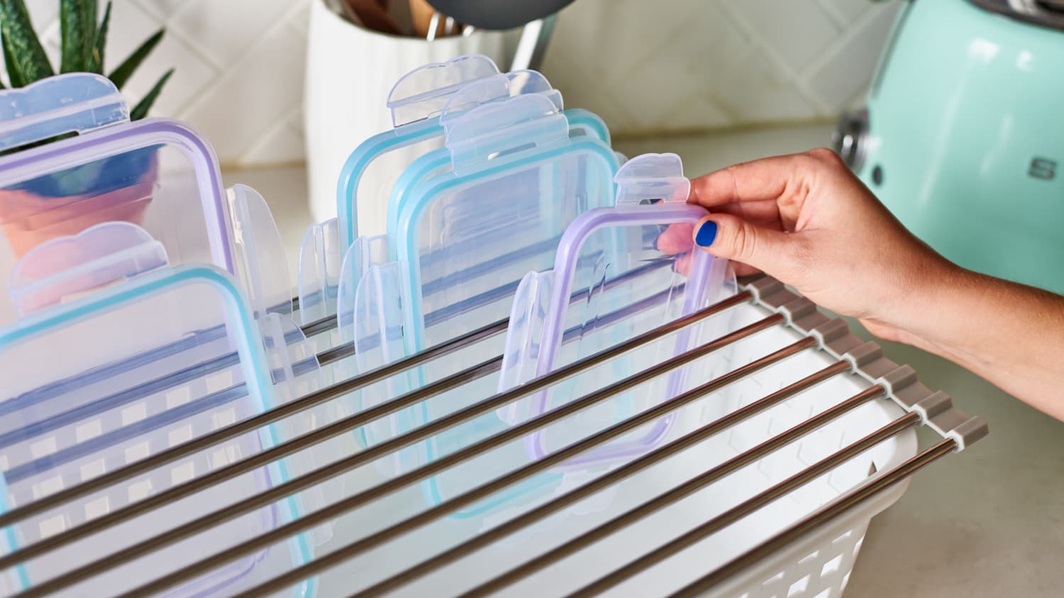 The Brilliant Storage Hack That Keeps Your Plastic Container Lids Organized