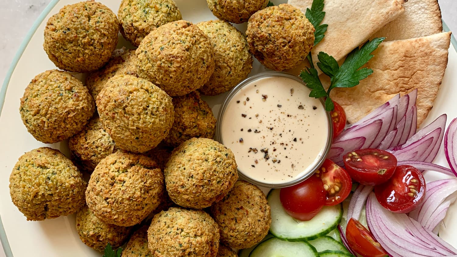 Close-up of crispy air fryer falafel fresh out of the air fryer