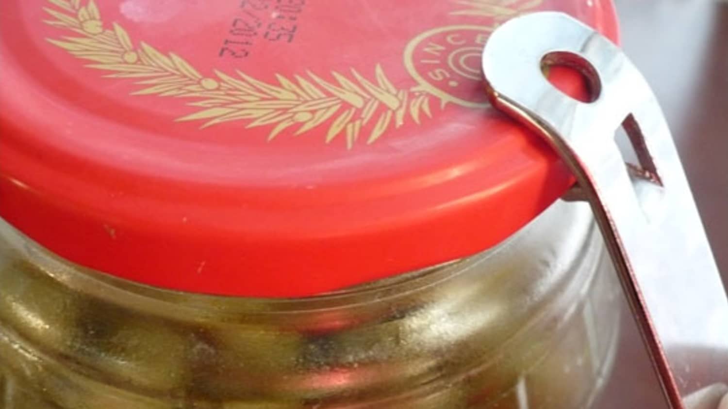 Hack to get stuck lid off a jar — with just a spoon — goes viral