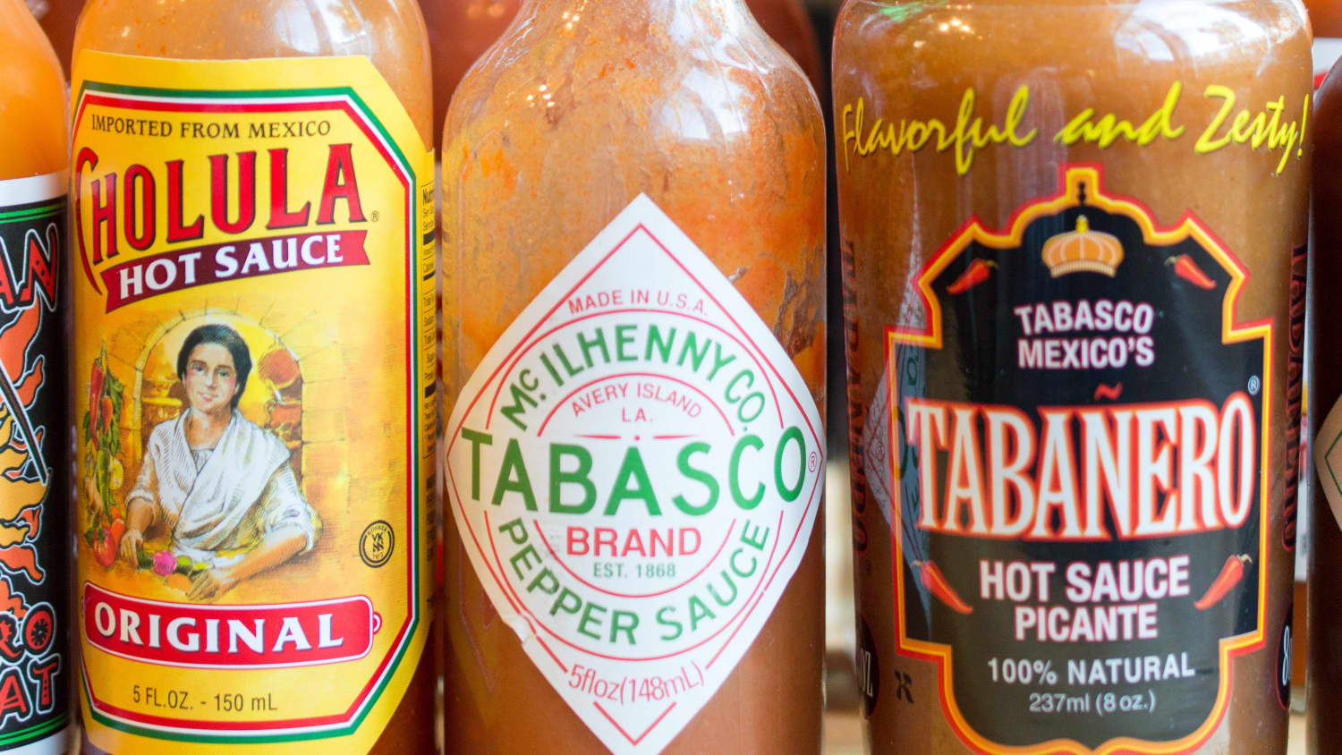 28 Hot Sauces You Need On Your Shelf & What To Pair Them With
