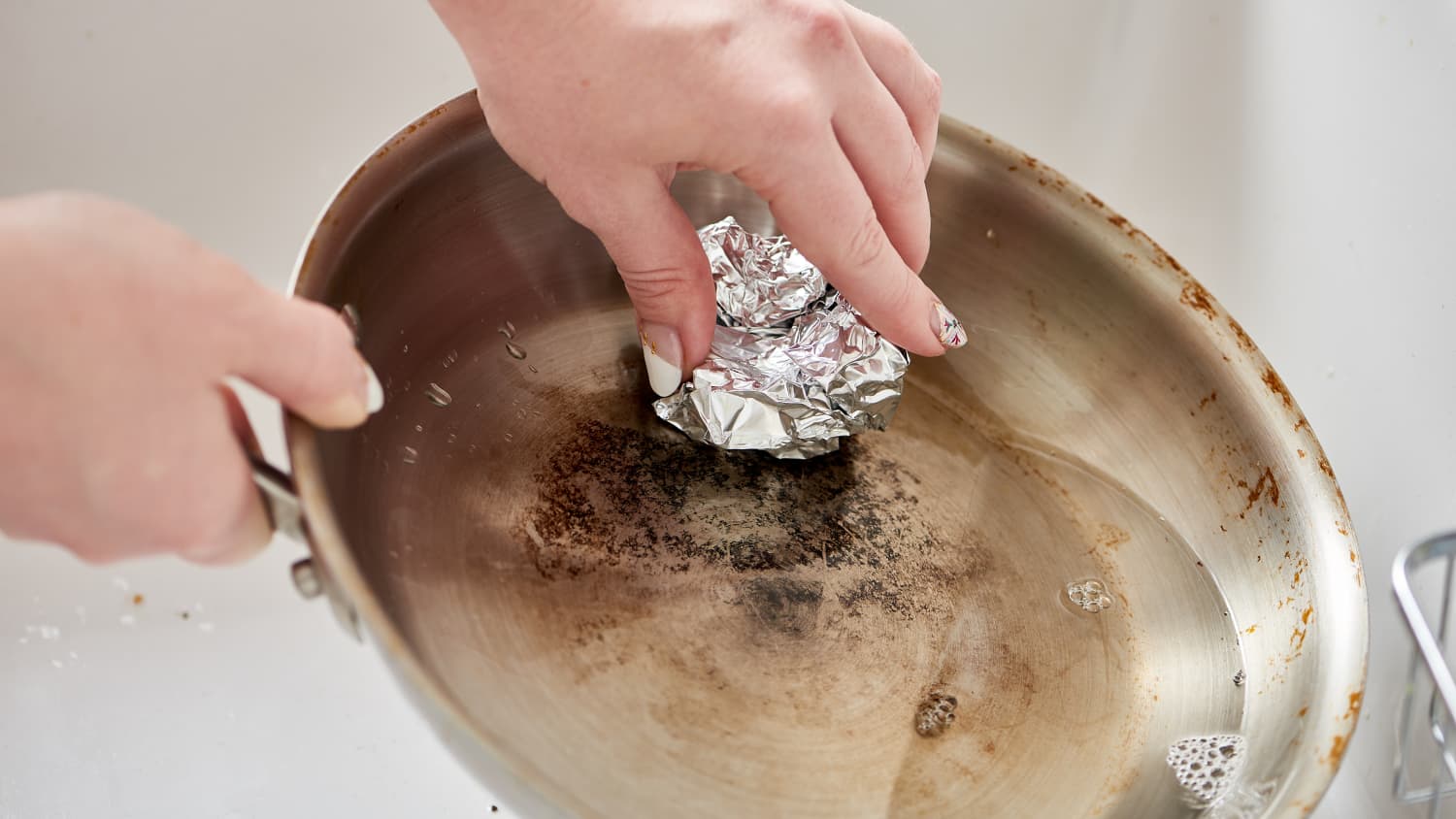 How do you clean silver with tin foil hot sale
