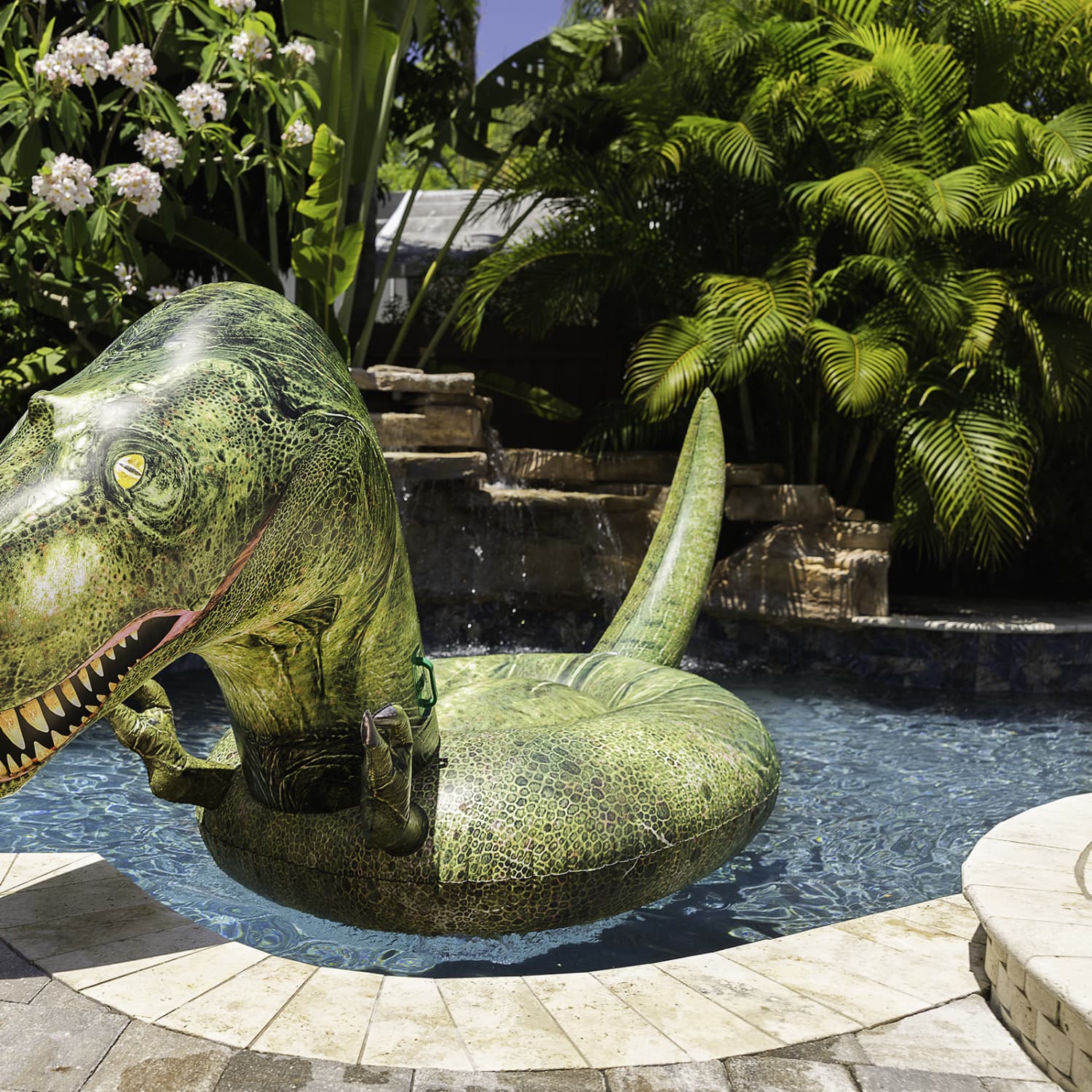 This Brand Is Selling a Giant T Rex Pool Float Apartment Therapy
