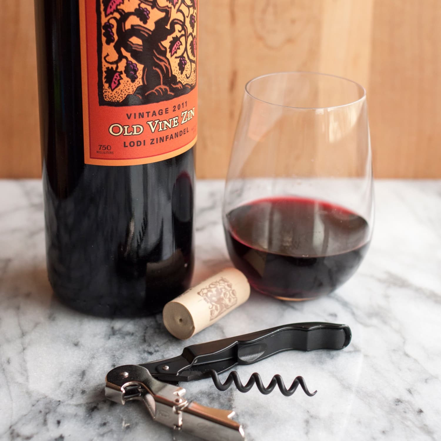How To Open a Bottle of Wine Using a Wine Key Corkscrew The Kitchn