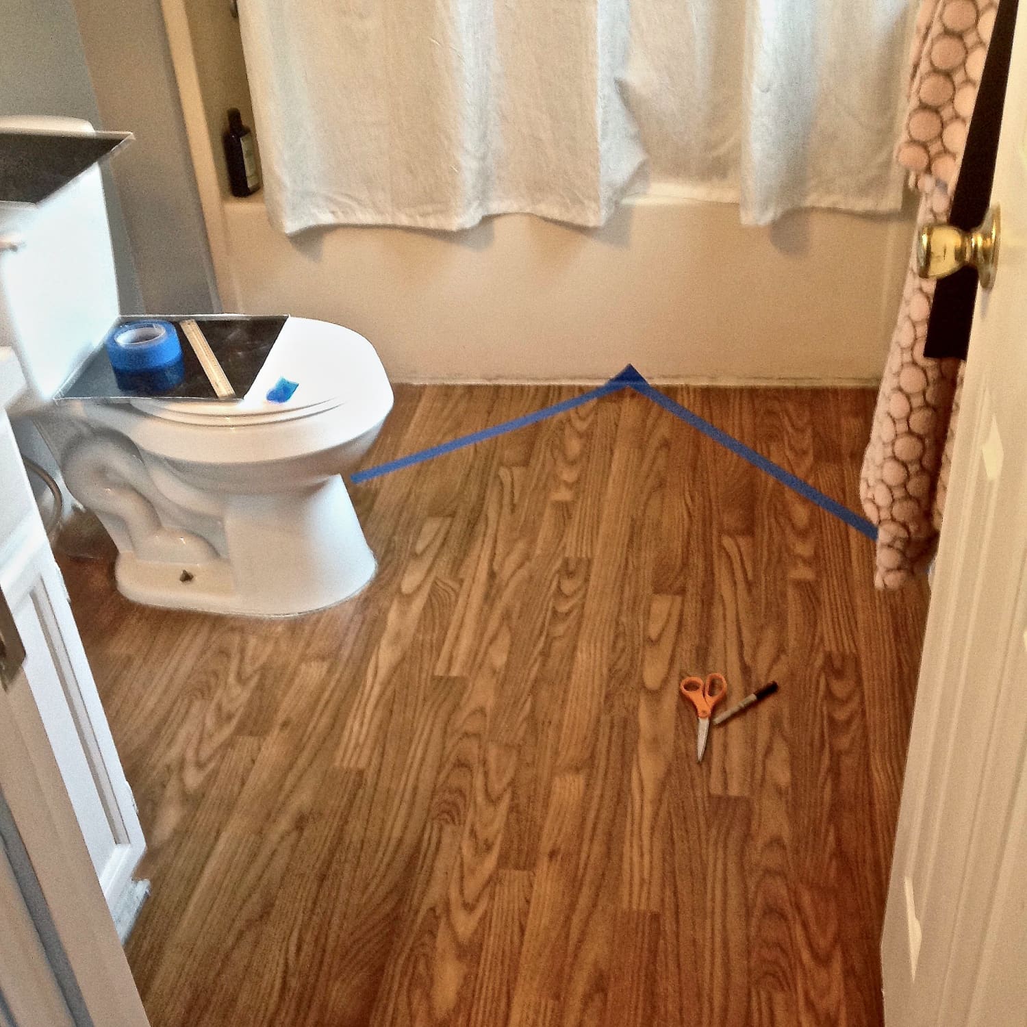 Hardwood floor cheap in bathroom