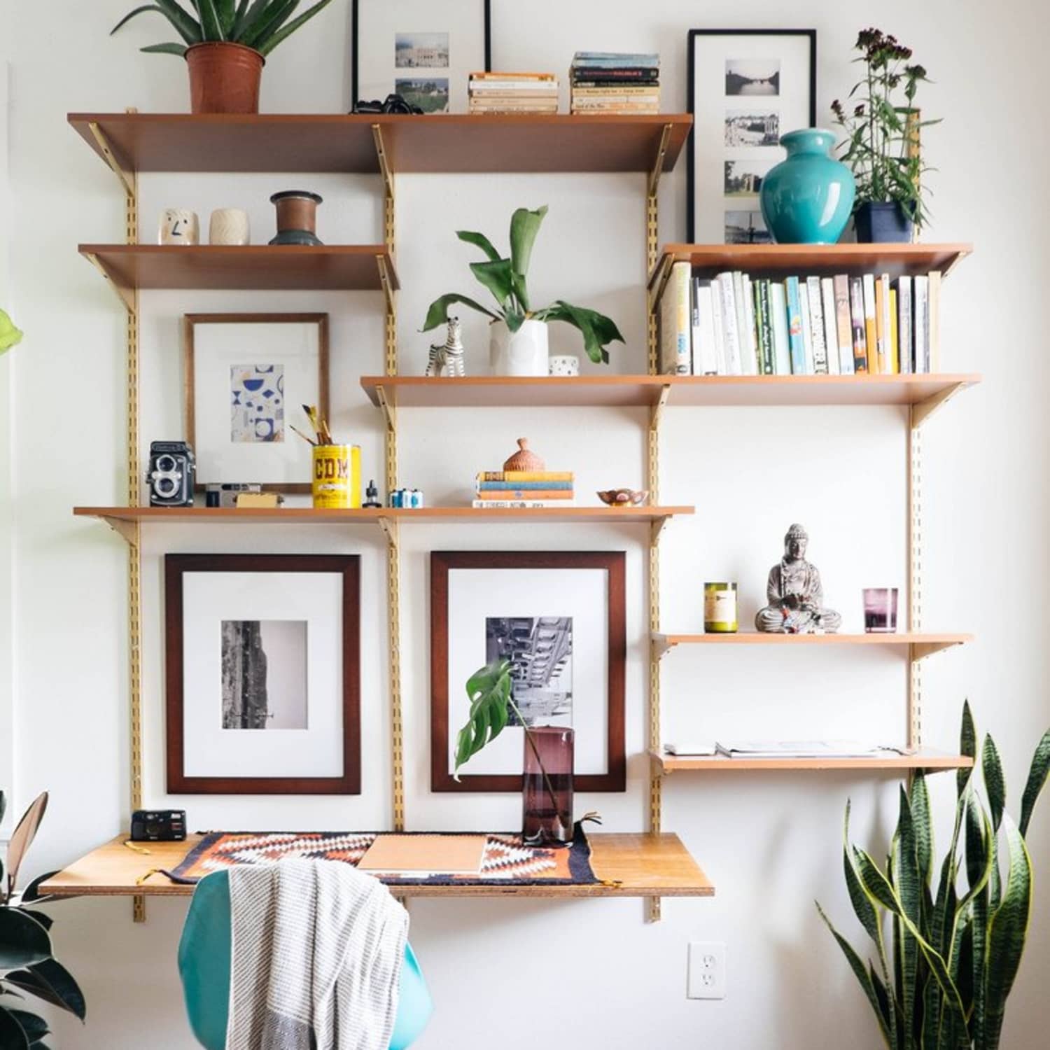 Wall clearance track shelving