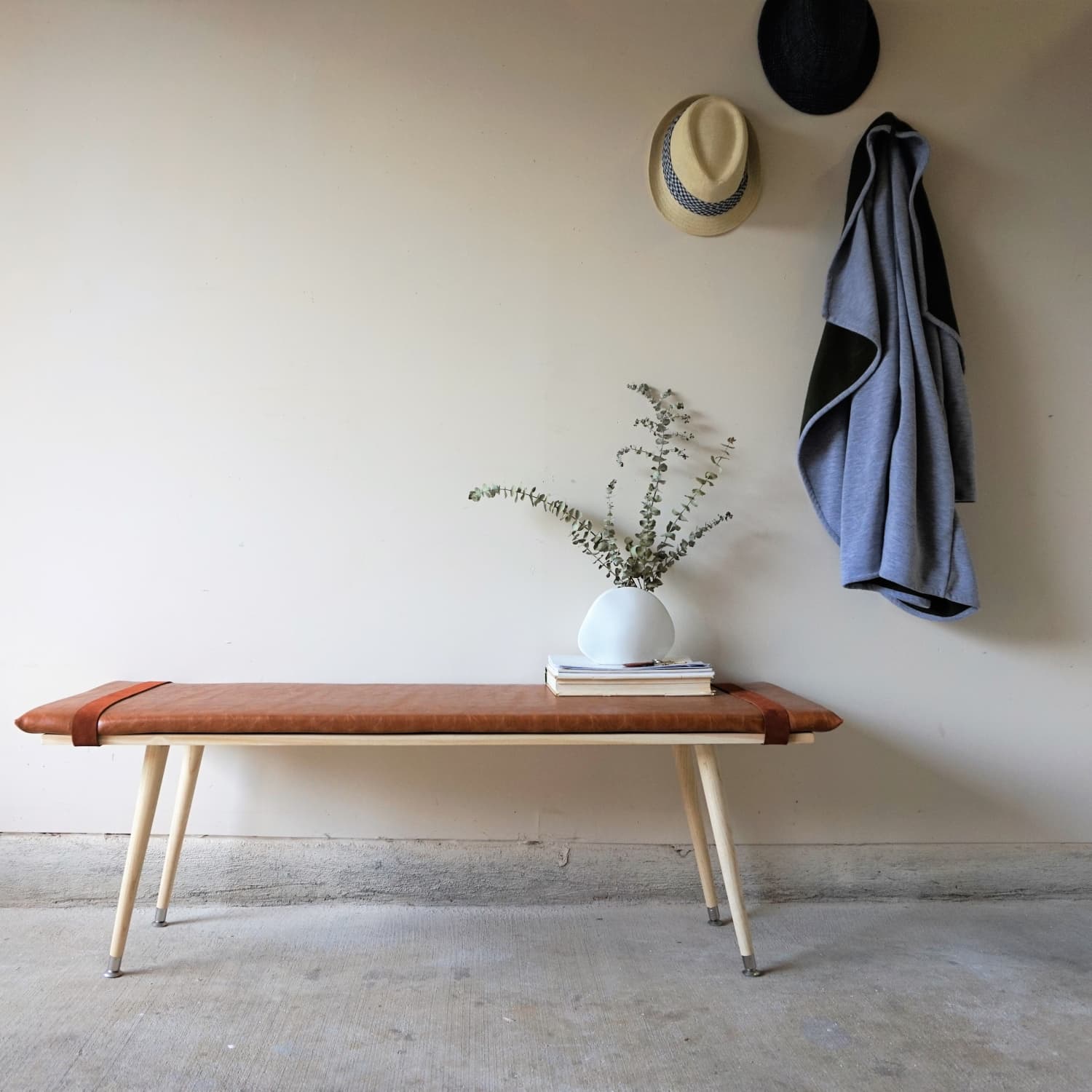 Leather on sale wrapped bench