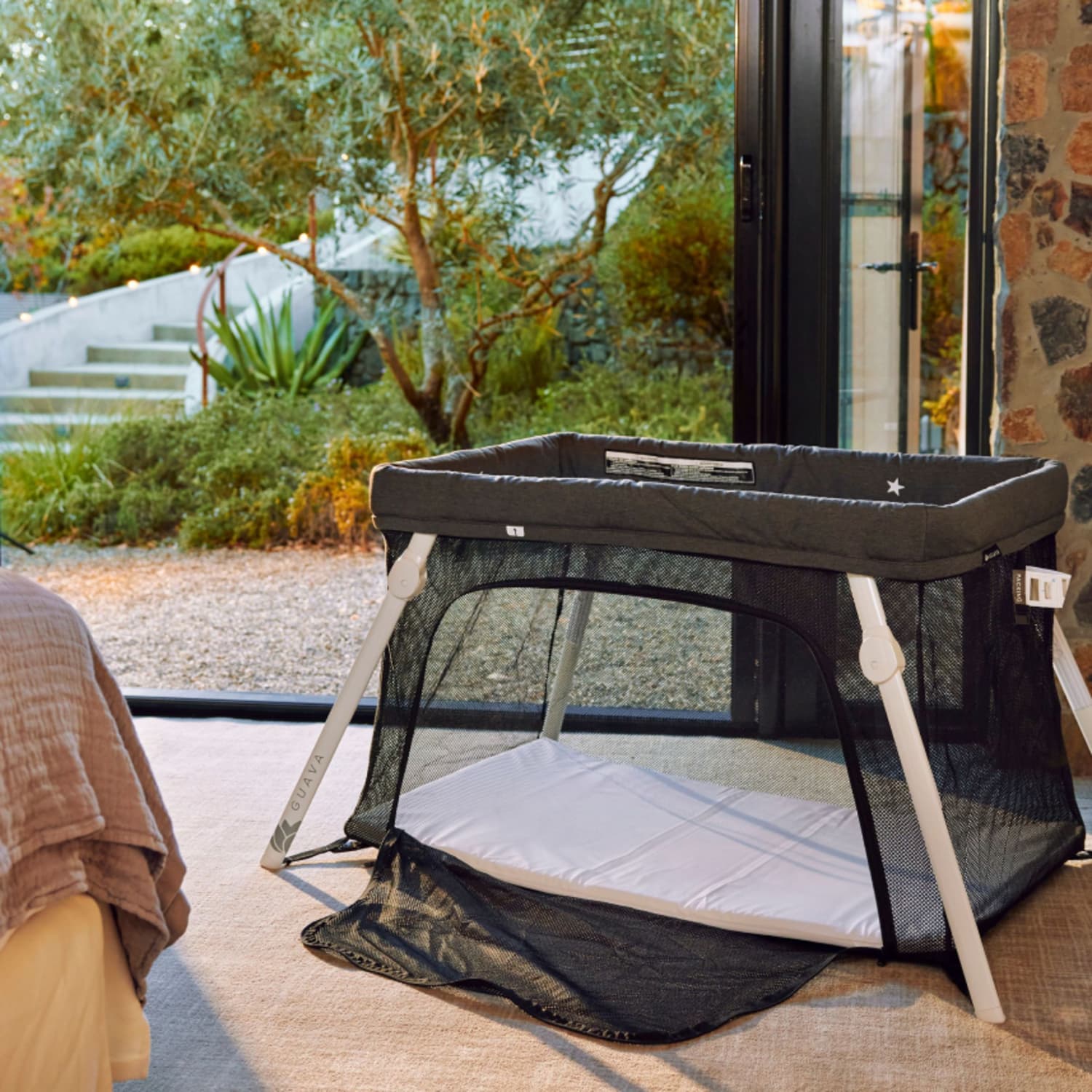 Guava Lotus Travel Crib Review Cubby