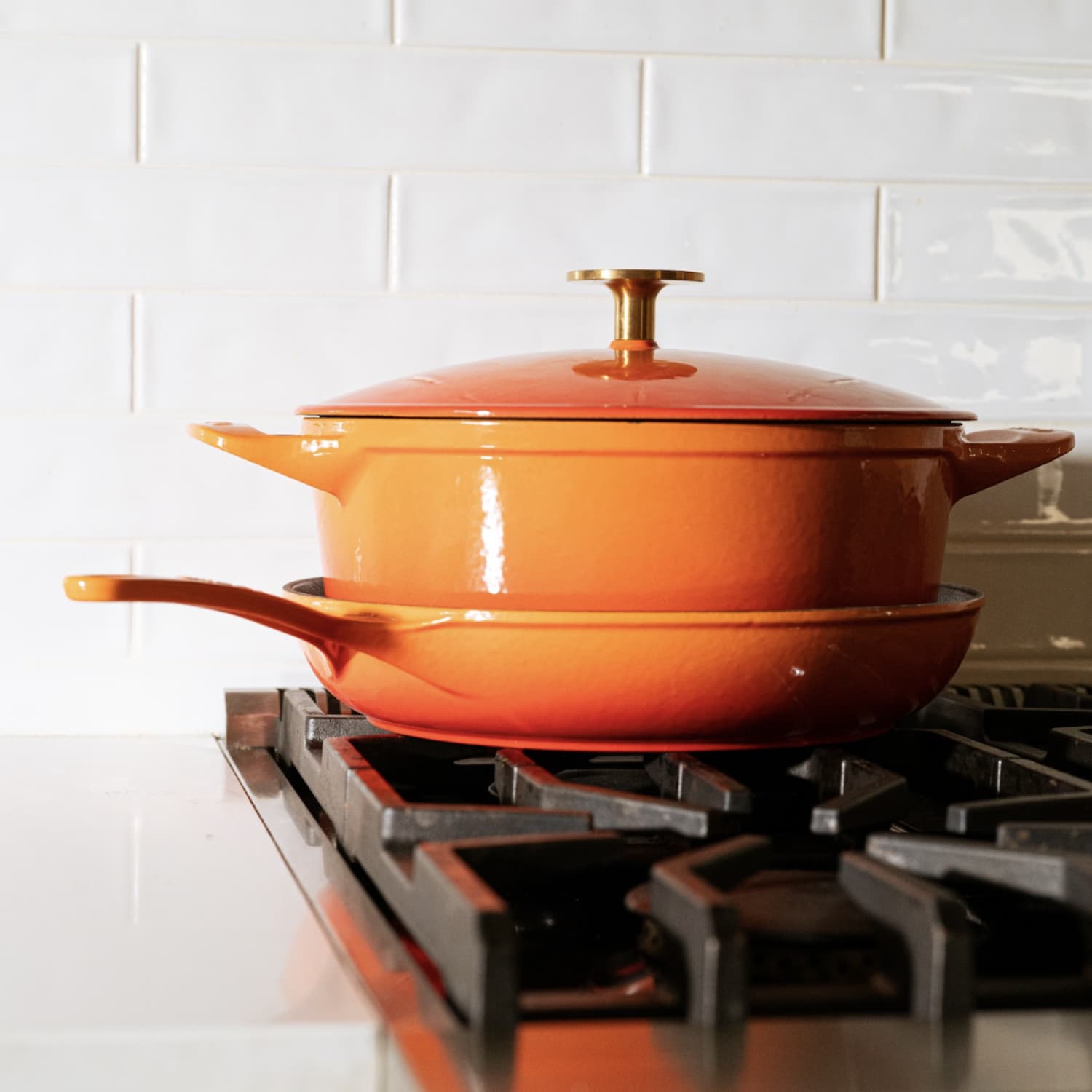 https://cdn.apartmenttherapy.info/image/upload/f_jpg,q_auto:eco,c_fill,g_auto,w_1500,ar_1:1/commerce%2FMade-In-Orange-Enameled-Cast-Iron-Set