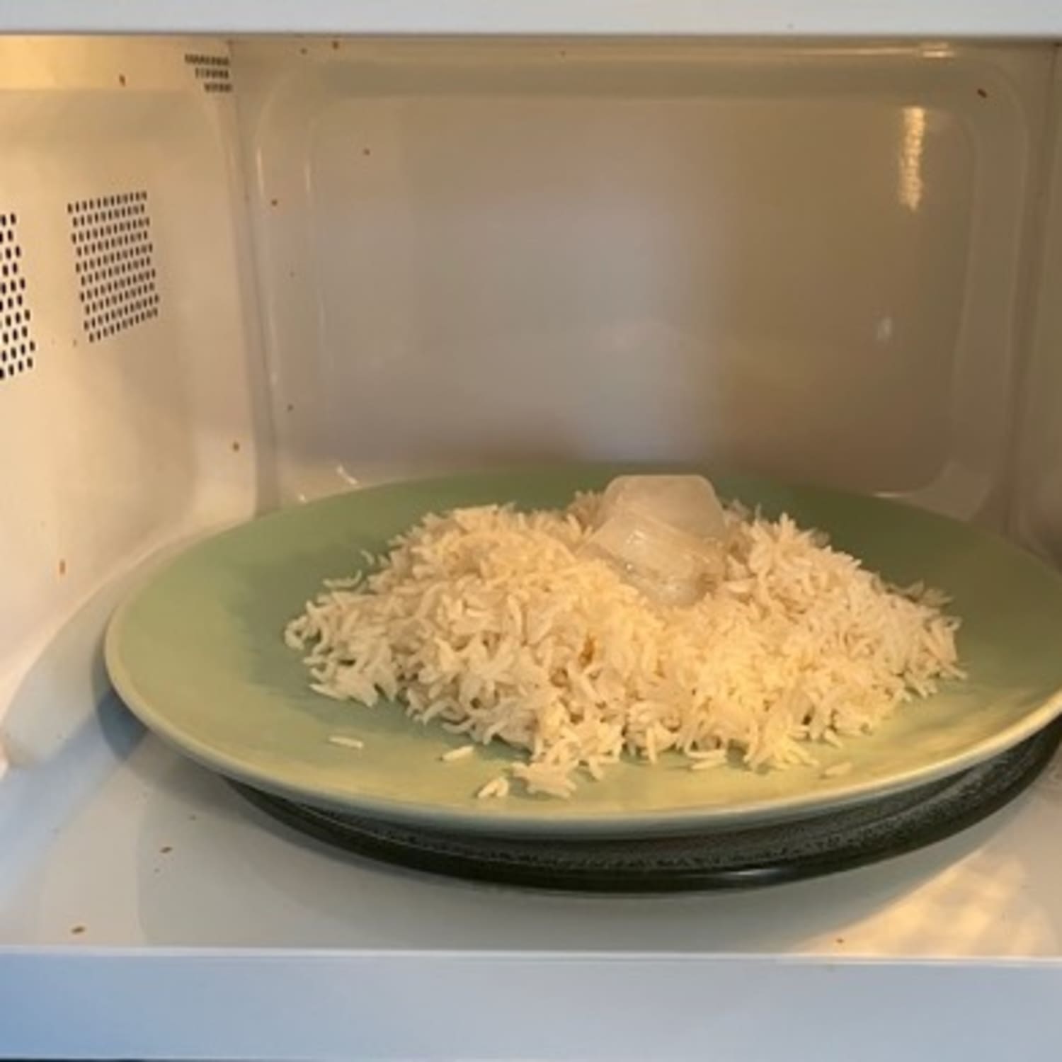 How To Reheat Rice In The Microwave With An Ice Cube Tiktok Kitchn