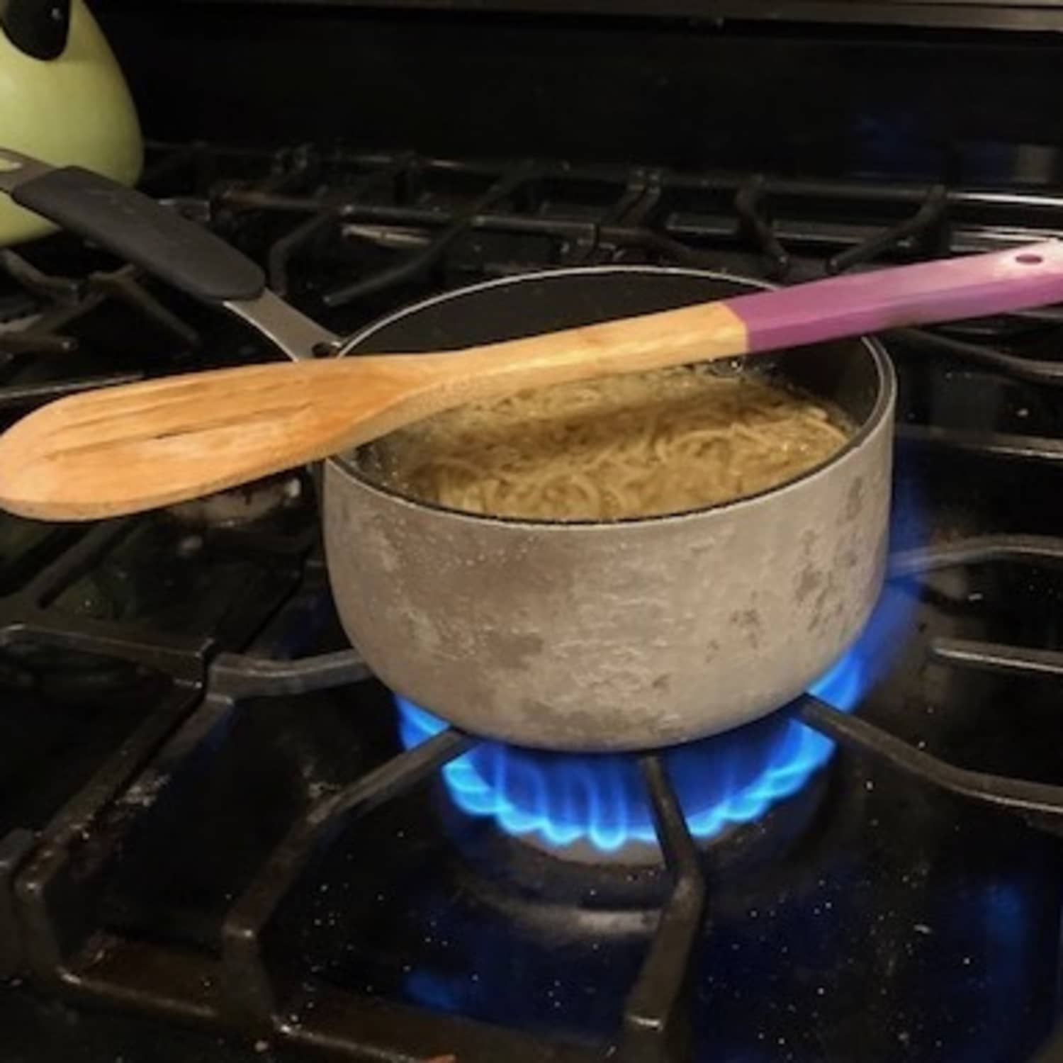 Why Does a Wooden Spoon Stop Water From Boiling Over?