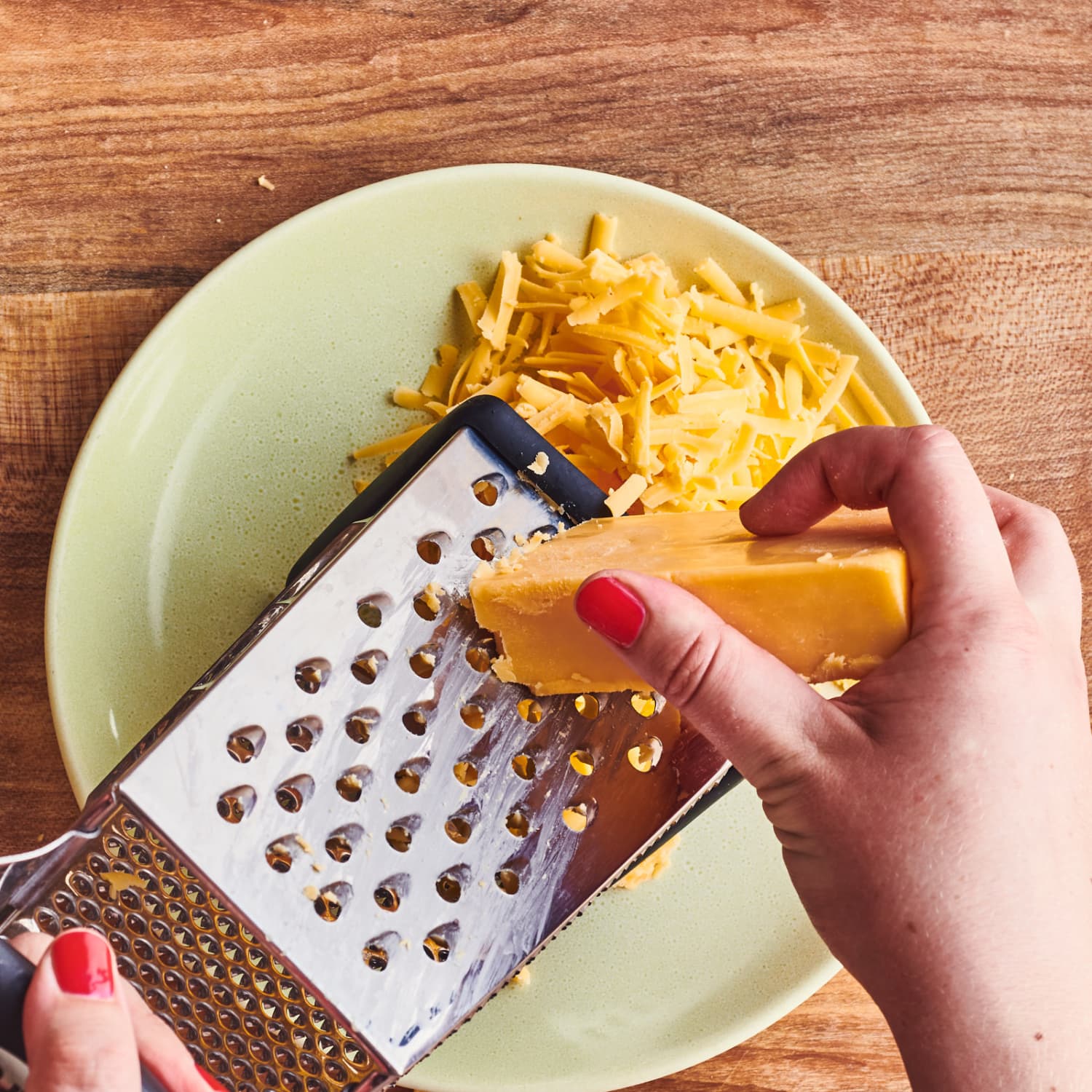 The right way to shred cheese with a cheese grater - Reviewed