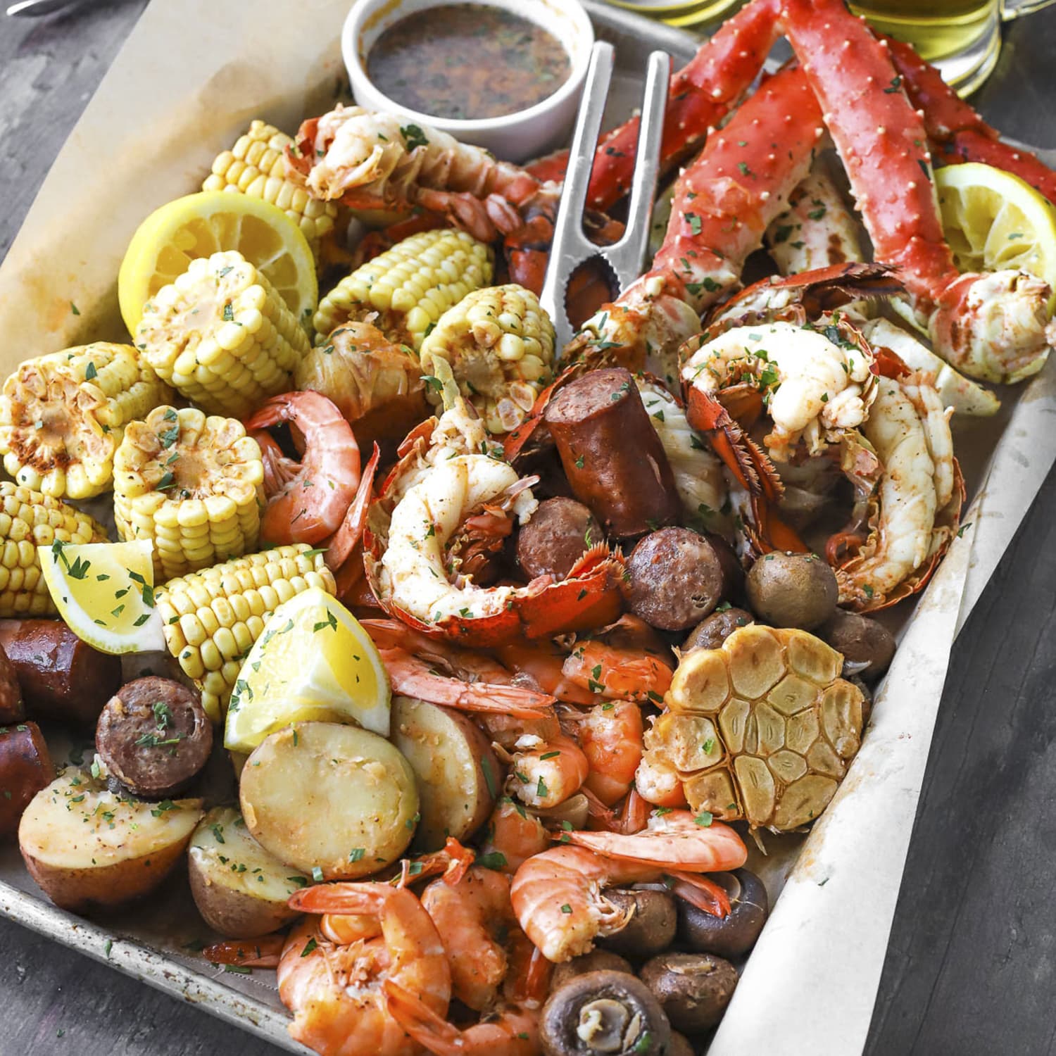 Seafood Boil Recipe (With Buttery Herb Dipping Sauce)