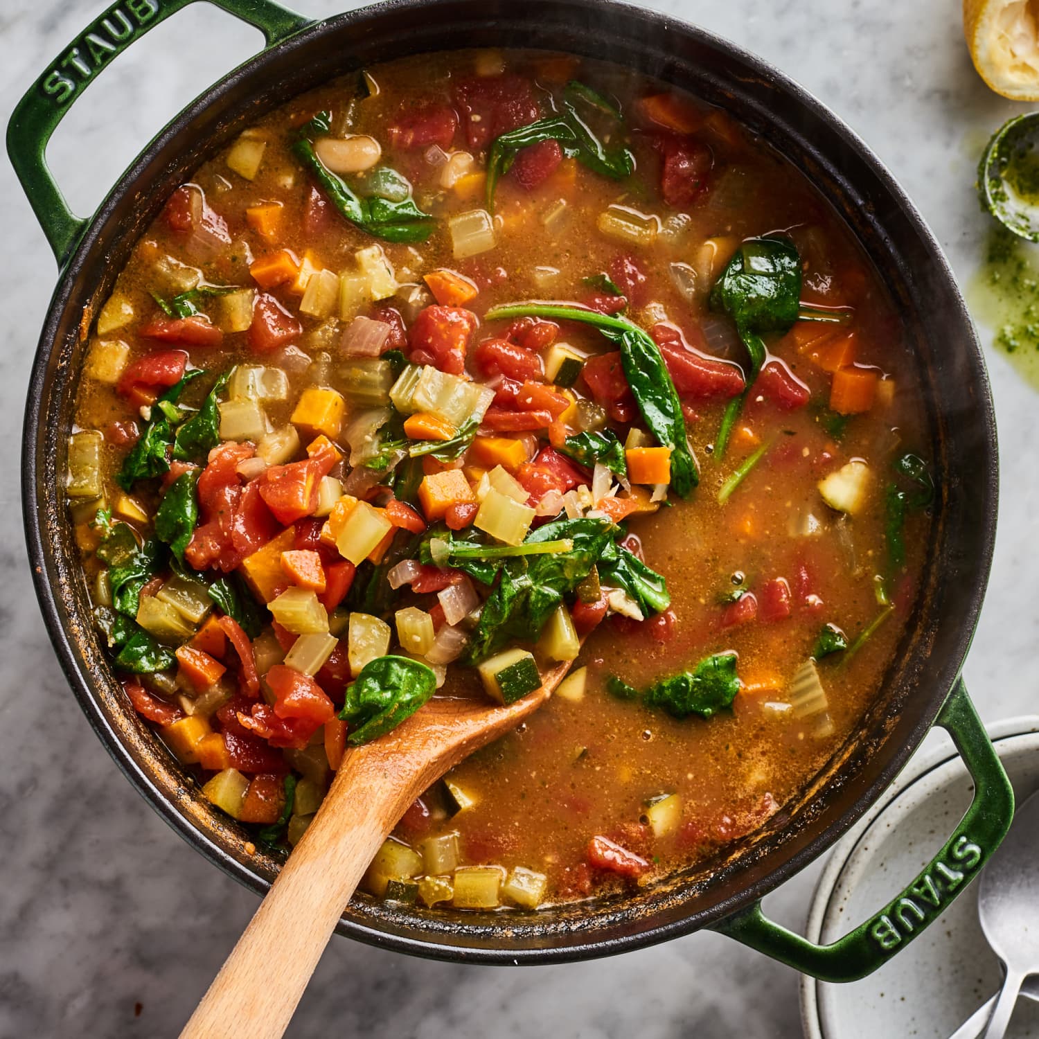 https://cdn.apartmenttherapy.info/image/upload/f_jpg,q_auto:eco,c_fill,g_auto,w_1500,ar_1:1/k%2FPhoto%2FRecipes%2F2019-12-How-To-Classic-Minestrone-Soup%2FHT-Classic-Minestrone-Soup_035
