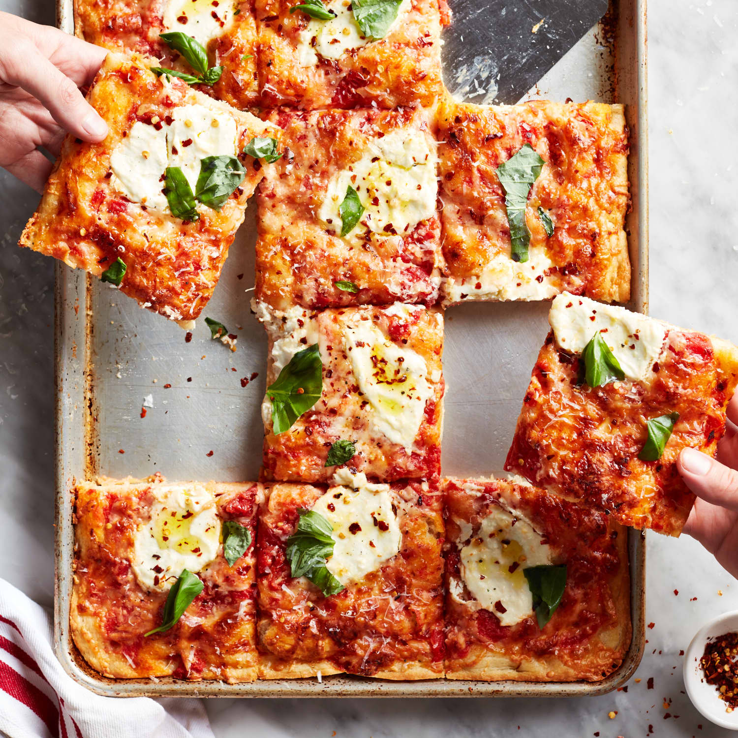 SHEET PAN FOCACCIA PIZZA WITH CRUSHED SAN MARZANOS & MOZZARELLA