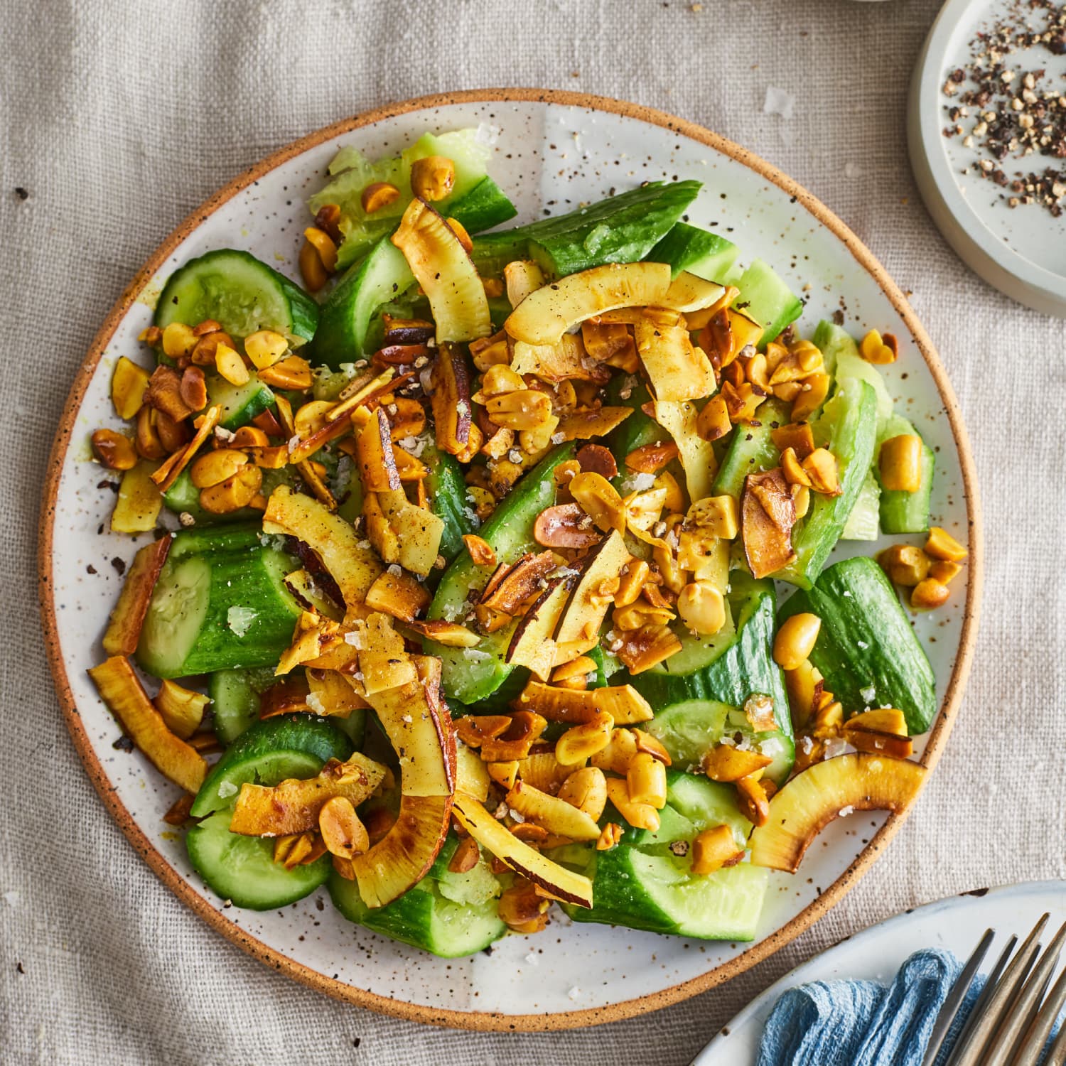Smashed Cucumbers With Turmeric Coconut And Peanuts Kitchn