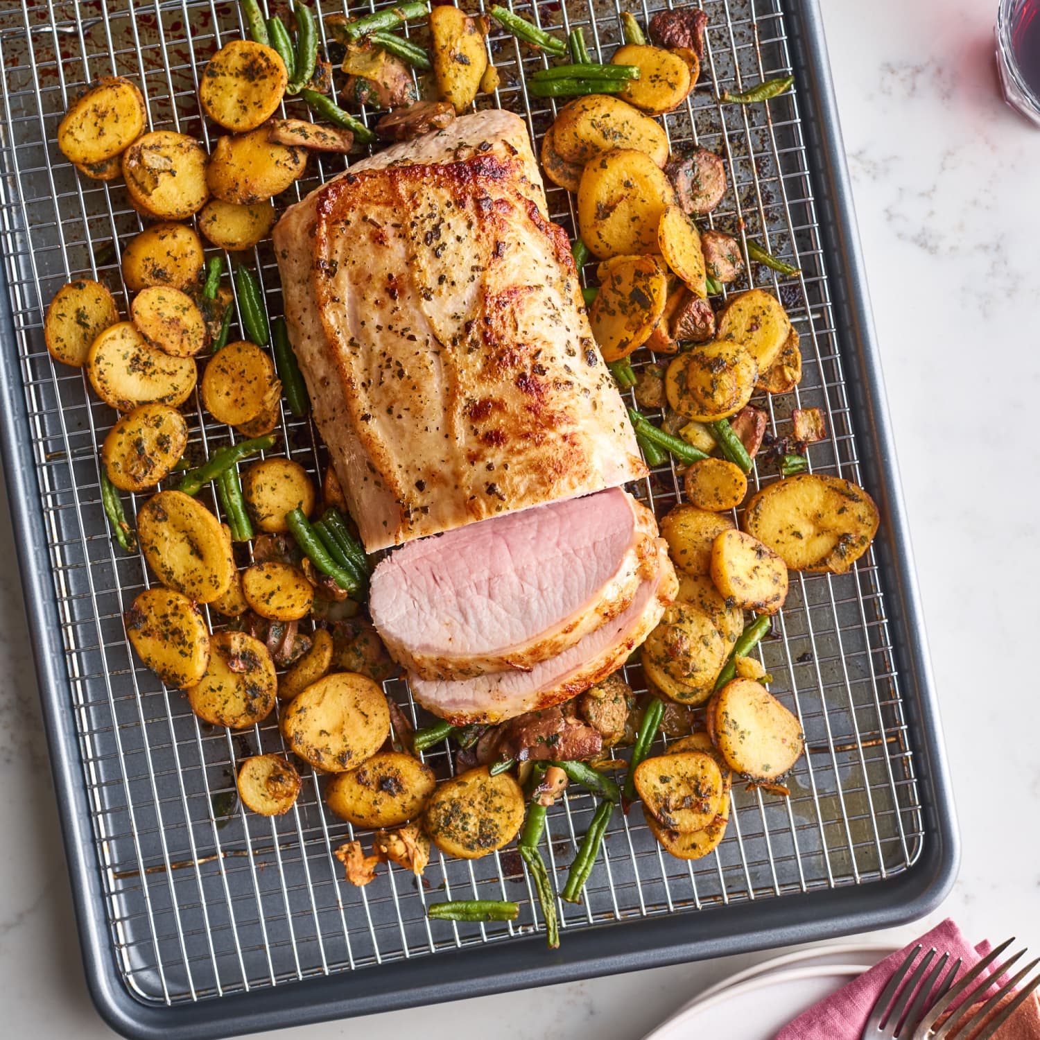 Trader Joe S Pork Loin And Herb Potatoes Dinner Idea Kitchn Roasting at high heat leaves the tenderloins i have to admit, the first time i made this sheet pan pork dinner, i was a little skeptical. sheet pan pork loin with herb potatoes and vegetables