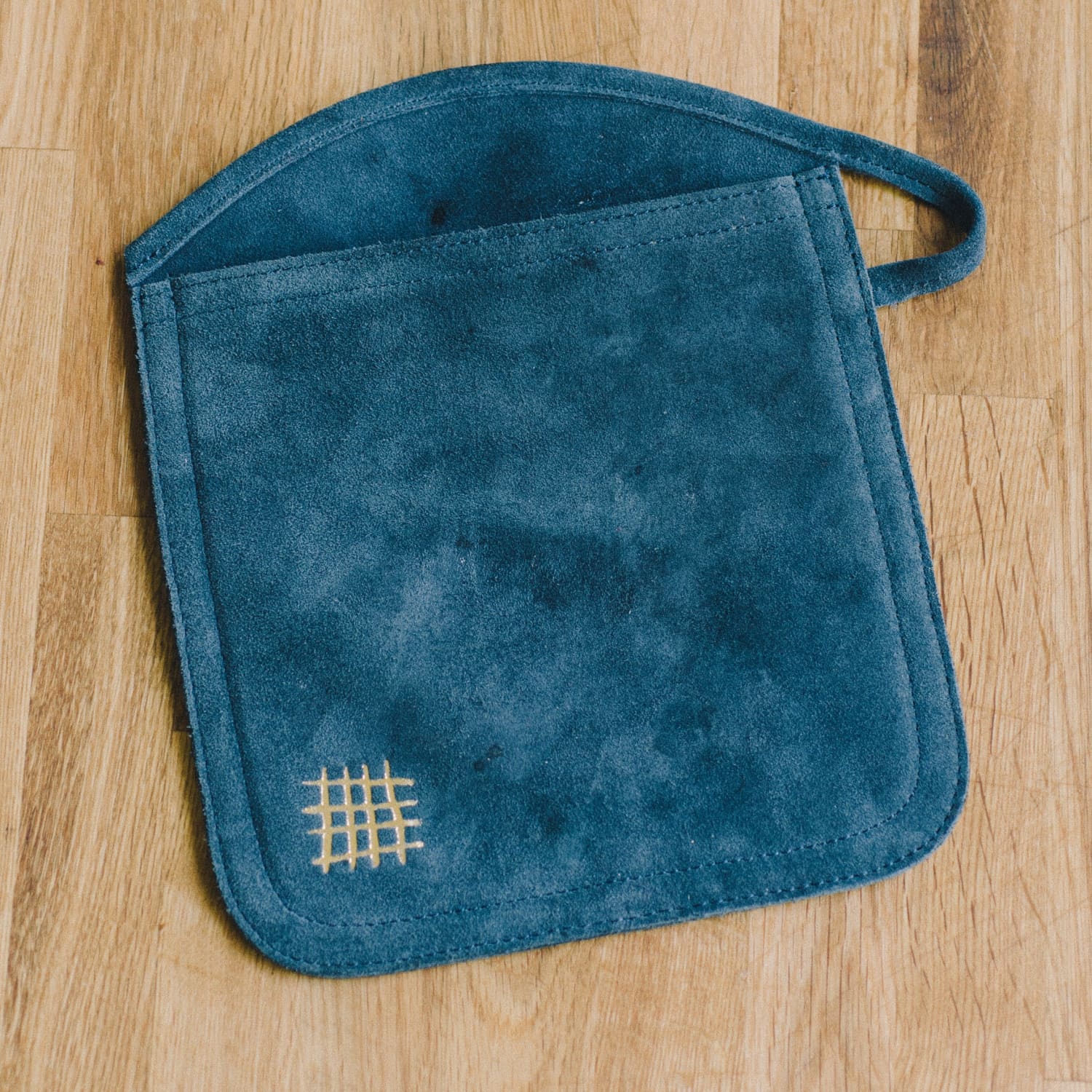 I Finally Found The Perfect Potholder And It S Blue Suede Of All Things Kitchn