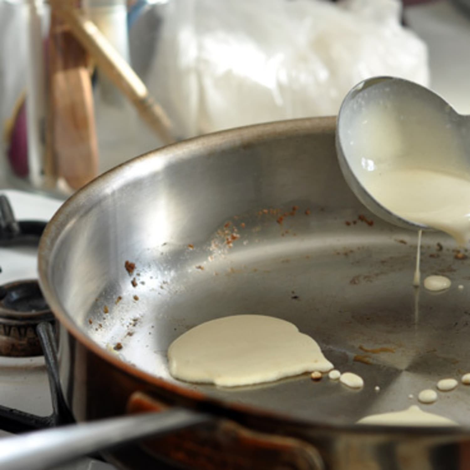 How Can I Cook Pancakes and Eggs in a Stainless Steel Pan?