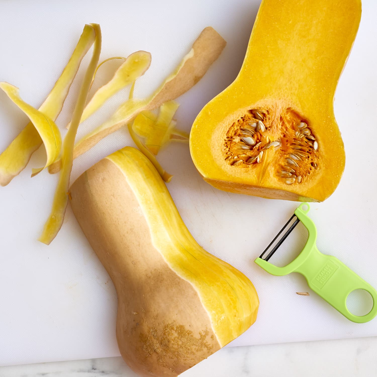 Peeling the Squash, Using a potato peeler seems the best ro…, Sid