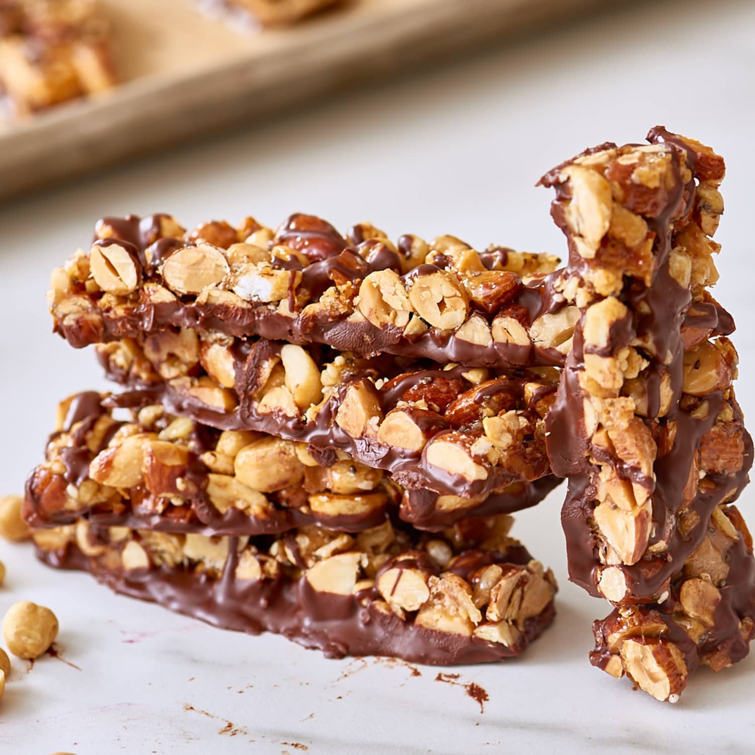 Chocolate-coated crunchy nut clusters make this sweet treat an easy snack  or a perfectly simple dessert. Made with our Millet Rice Flakes…