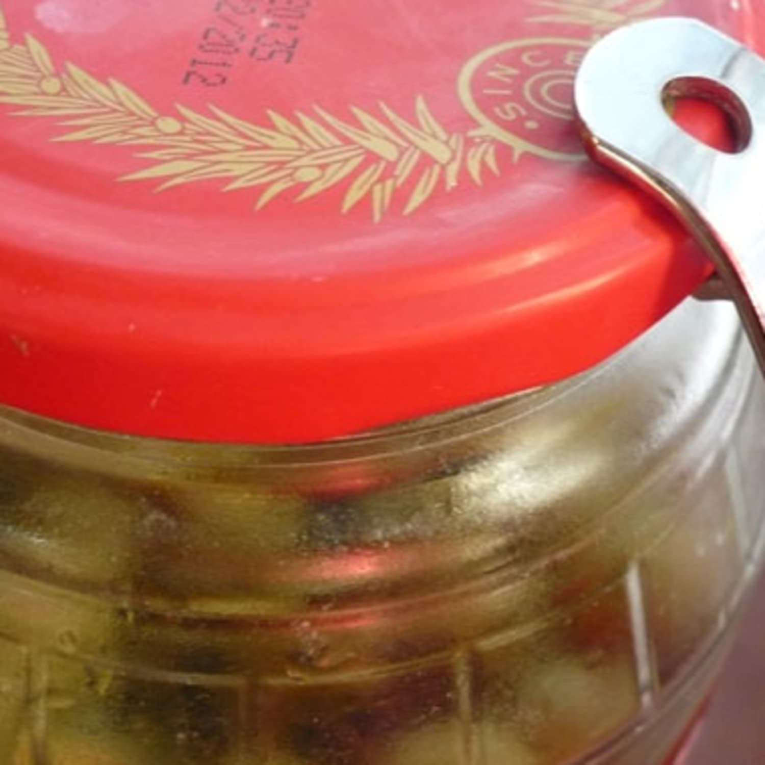 Quick Tip: Use a Bottle Opener on a Stubborn Jar Lid