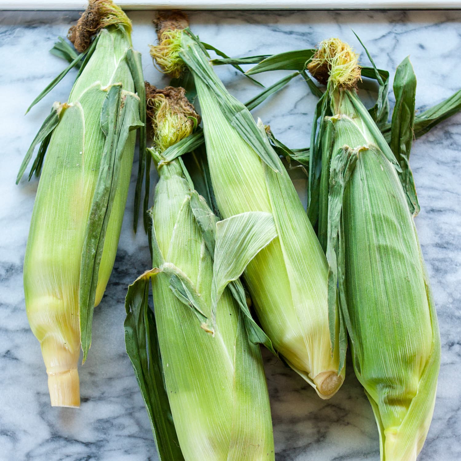 How To Shuck Corn Quickly Cleanly Kitchn An illustration depicting how corn stover is turned to biochar, then to activated carbon for water filtration. how to shuck corn like a midwesterner