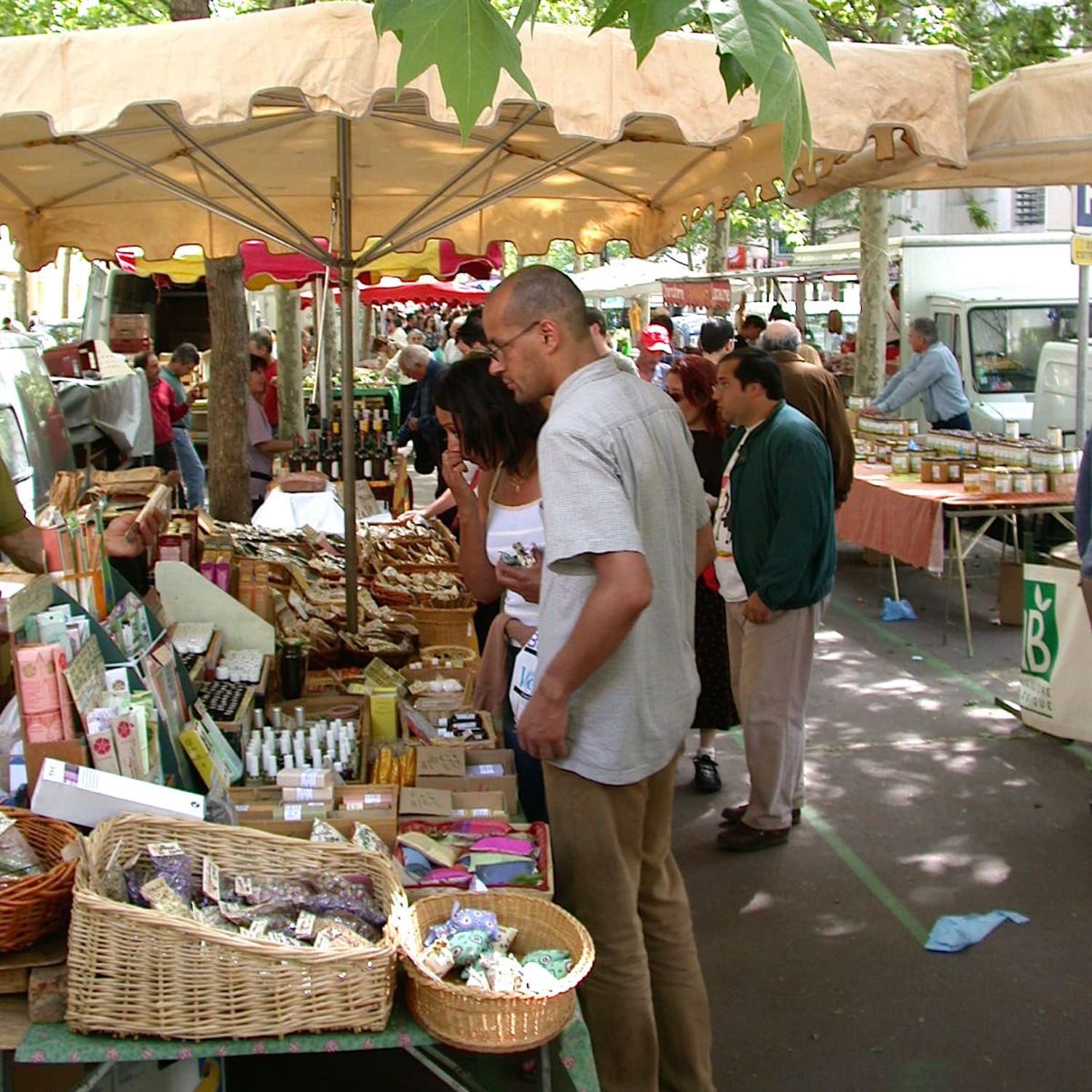 Fruit Stall With People Buying At Morlaix Weekly Market France