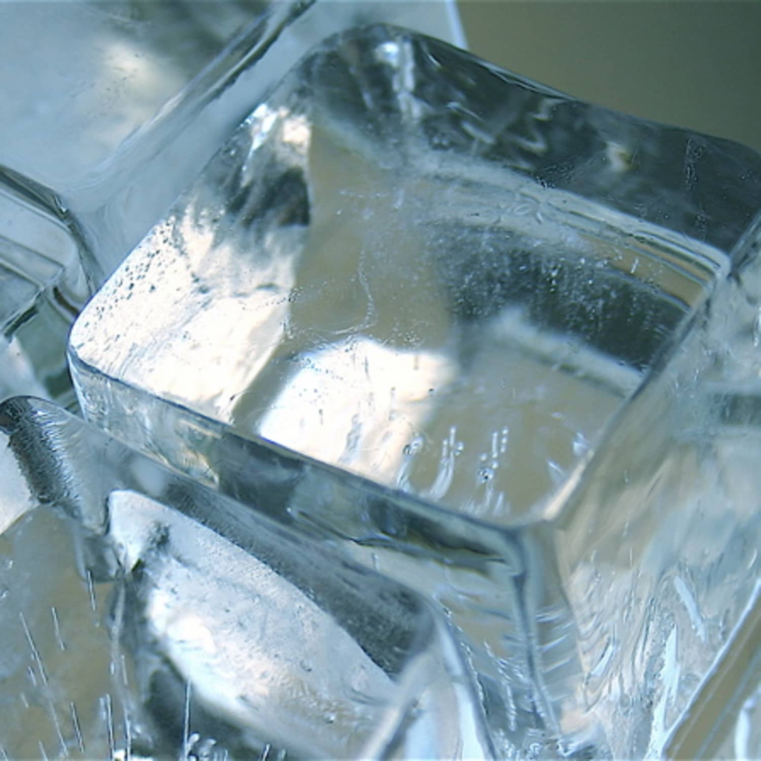 Why Does Water Freeze into Cloudy Ice Cubes in My Freezer?