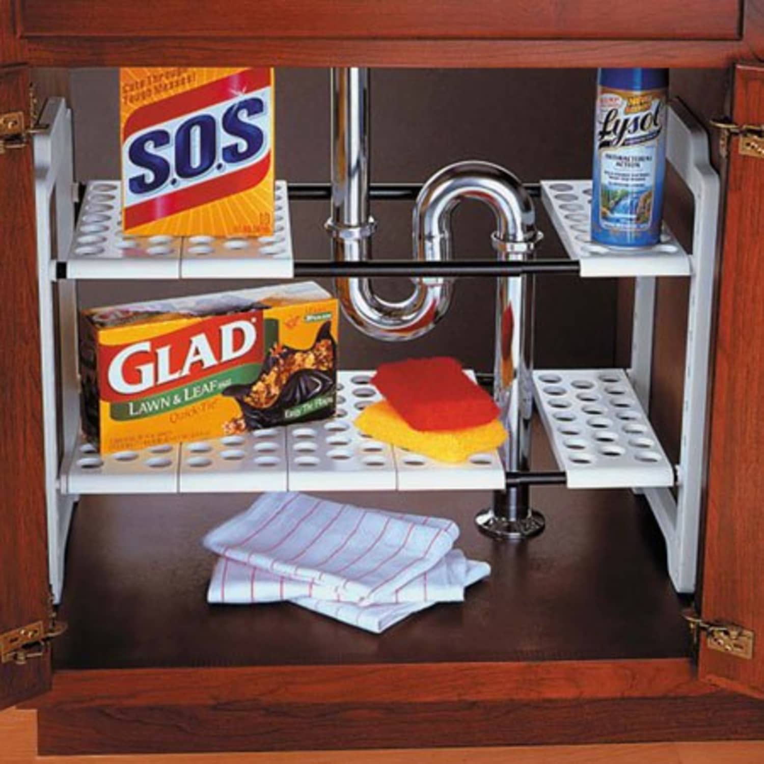 Look! Under-Sink Storage that Fits Around the Pipes  Under sink storage,  Under kitchen sink storage, Sink storage