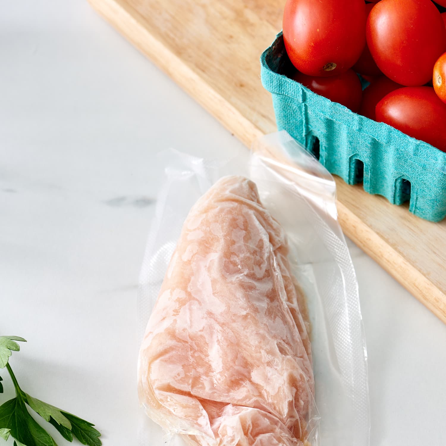 How To Thaw Out Frozen Chicken : The best way to defrost chicken quickly is to submerge it in cold water.