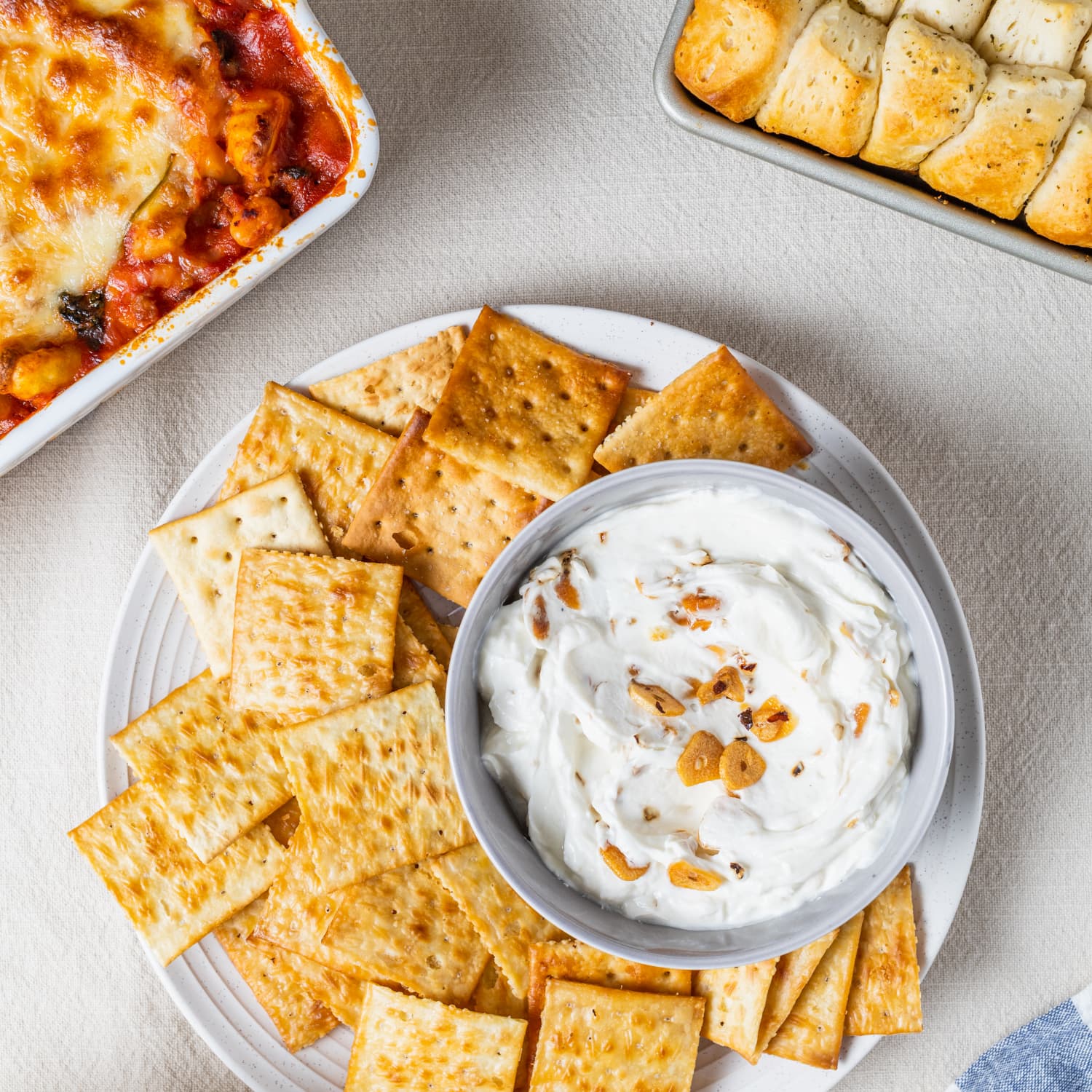 The Ultimate 10 Minute Potluck Appetizer Butter Baked Saltines with Chili Crisp Yogurt Dip