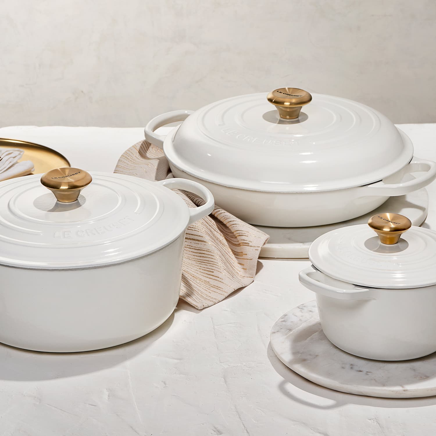 Le Creuset All-White Collection With Golden Knobs Has Launched