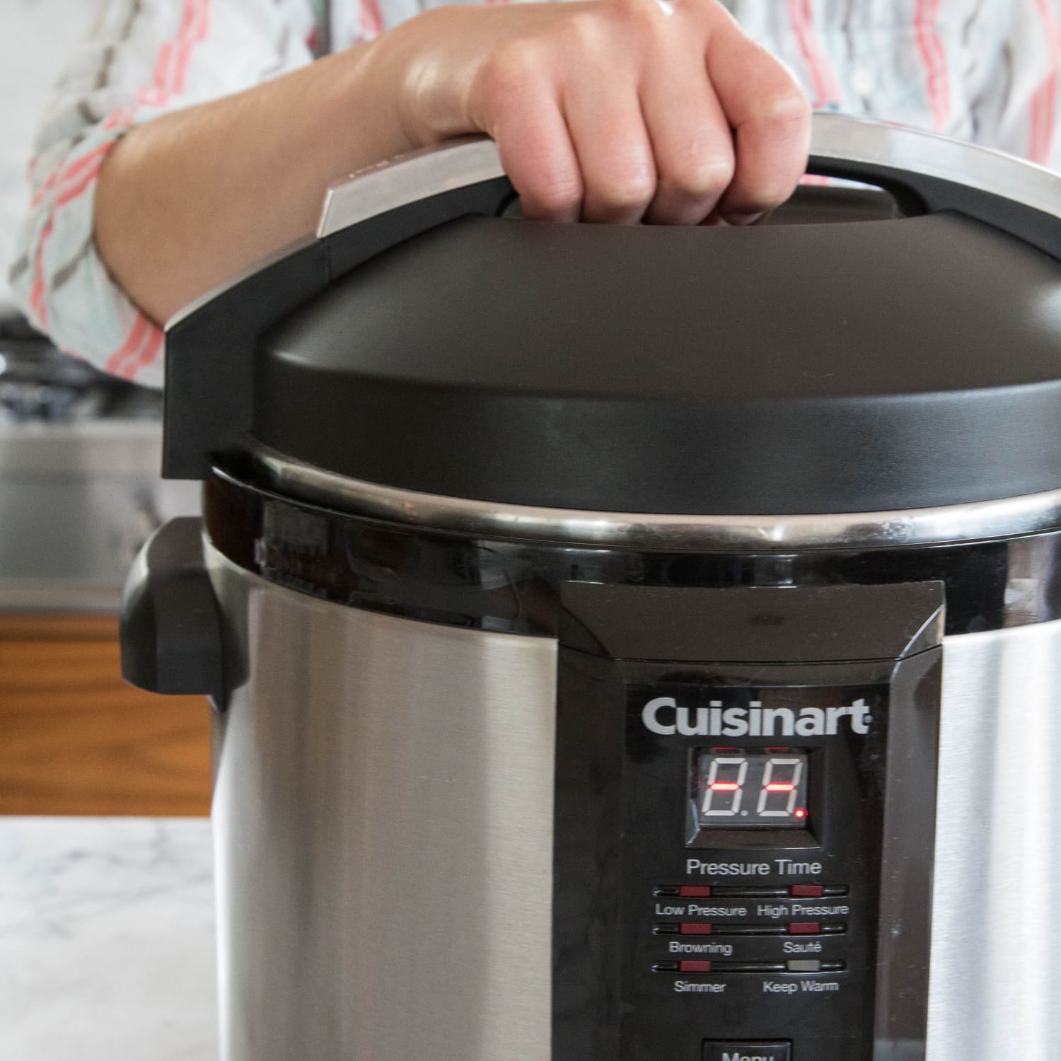Power cooker high pressure setting outlet