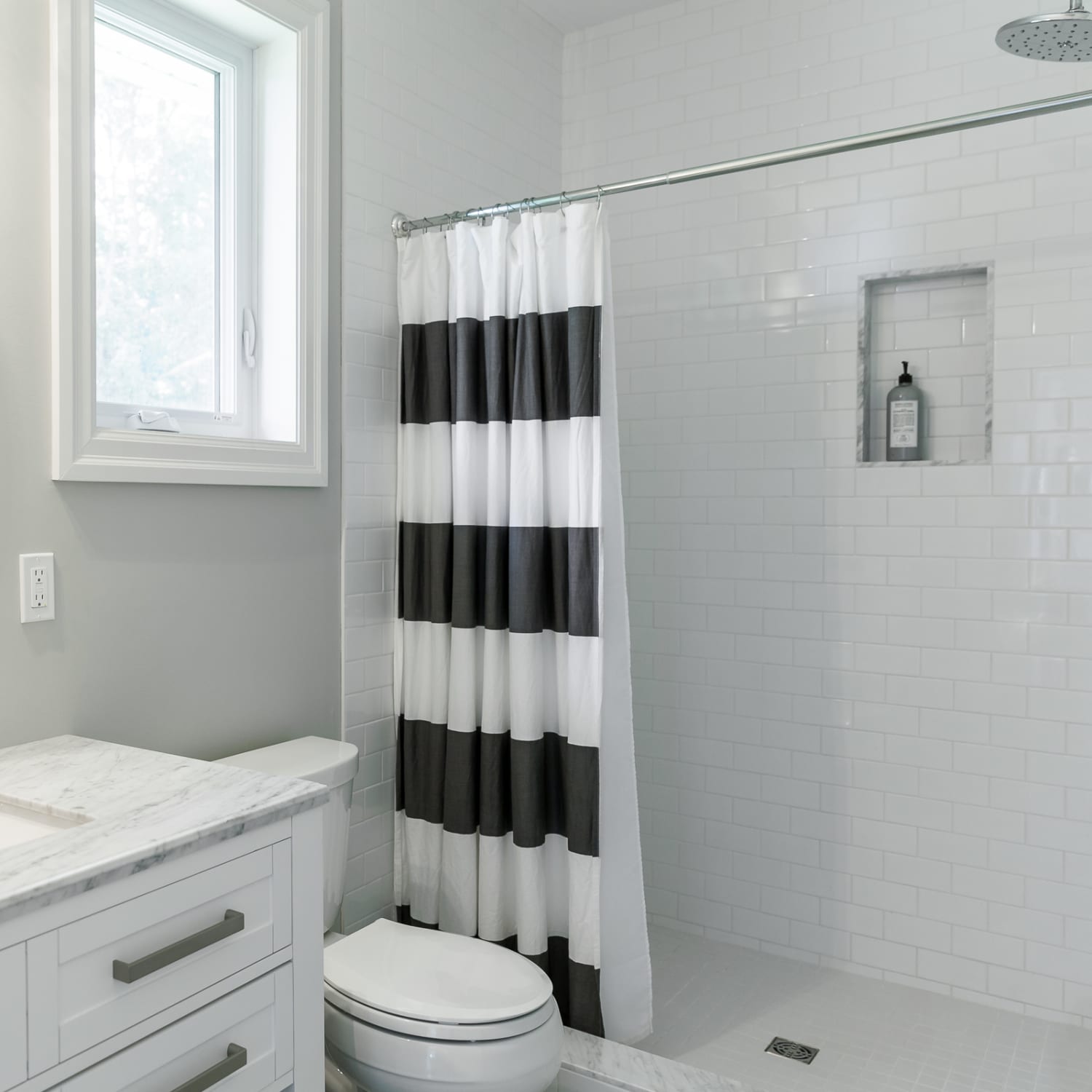 Use Extra Shower Curtain Rods to Increase Bathroom Storage & More