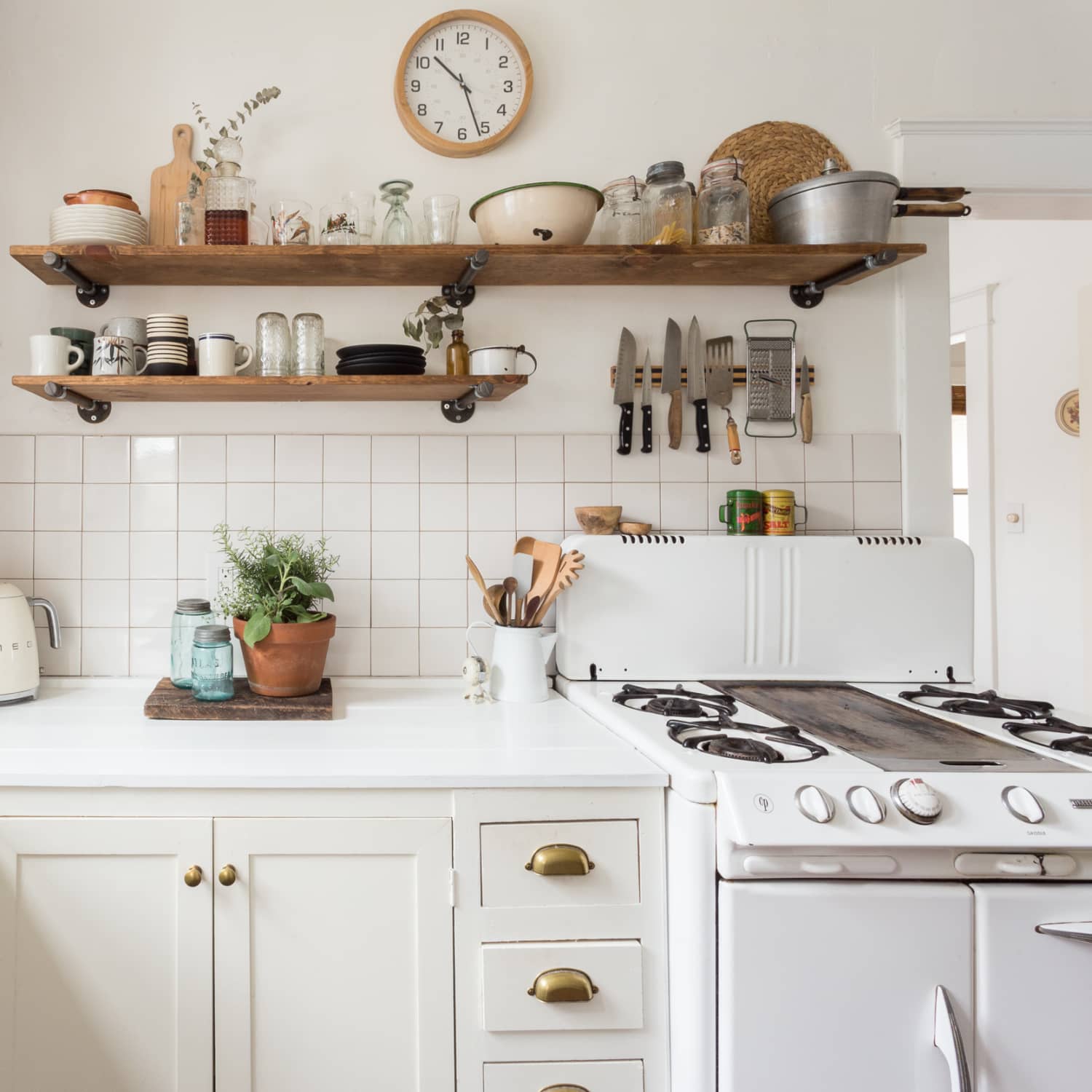 Create More Kitchen Storage: Install Open Shelving Above The Sink