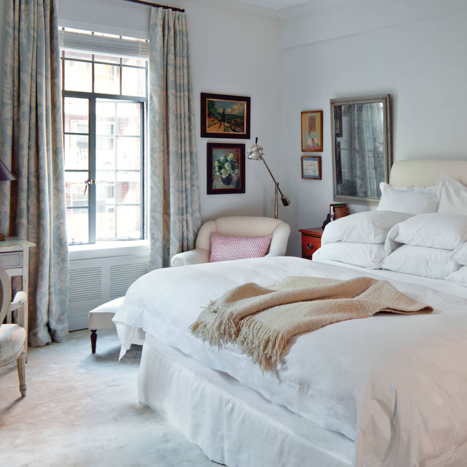 Cozy Bedrooms You Ll Never Want To Leave Apartment Therapy Everything else in the room is a bright white, allowing the olive coloring to complement it without it being too much of an eyesore. cozy bedrooms you ll never want to