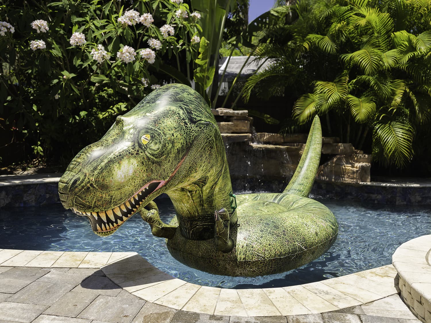 This Brand Is Selling a Giant T-Rex Pool Float