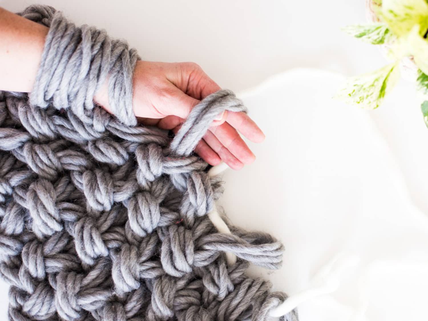 Get Cozy with a DIY Arm-Knitting Yarn Blanket Tutorial – Best Day of the  Week