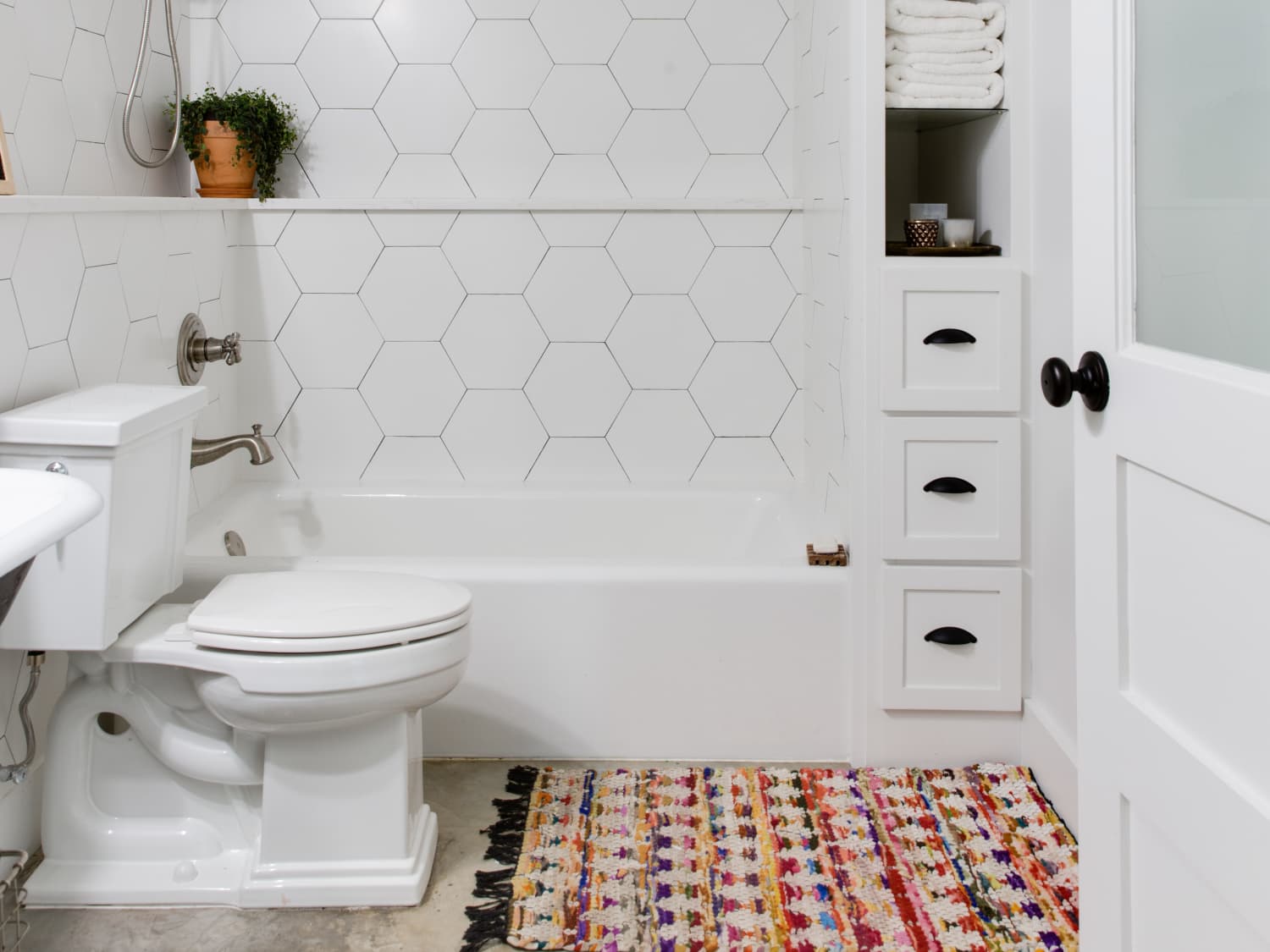 How to Use Adhesive Strips to Organize Your Bathroom