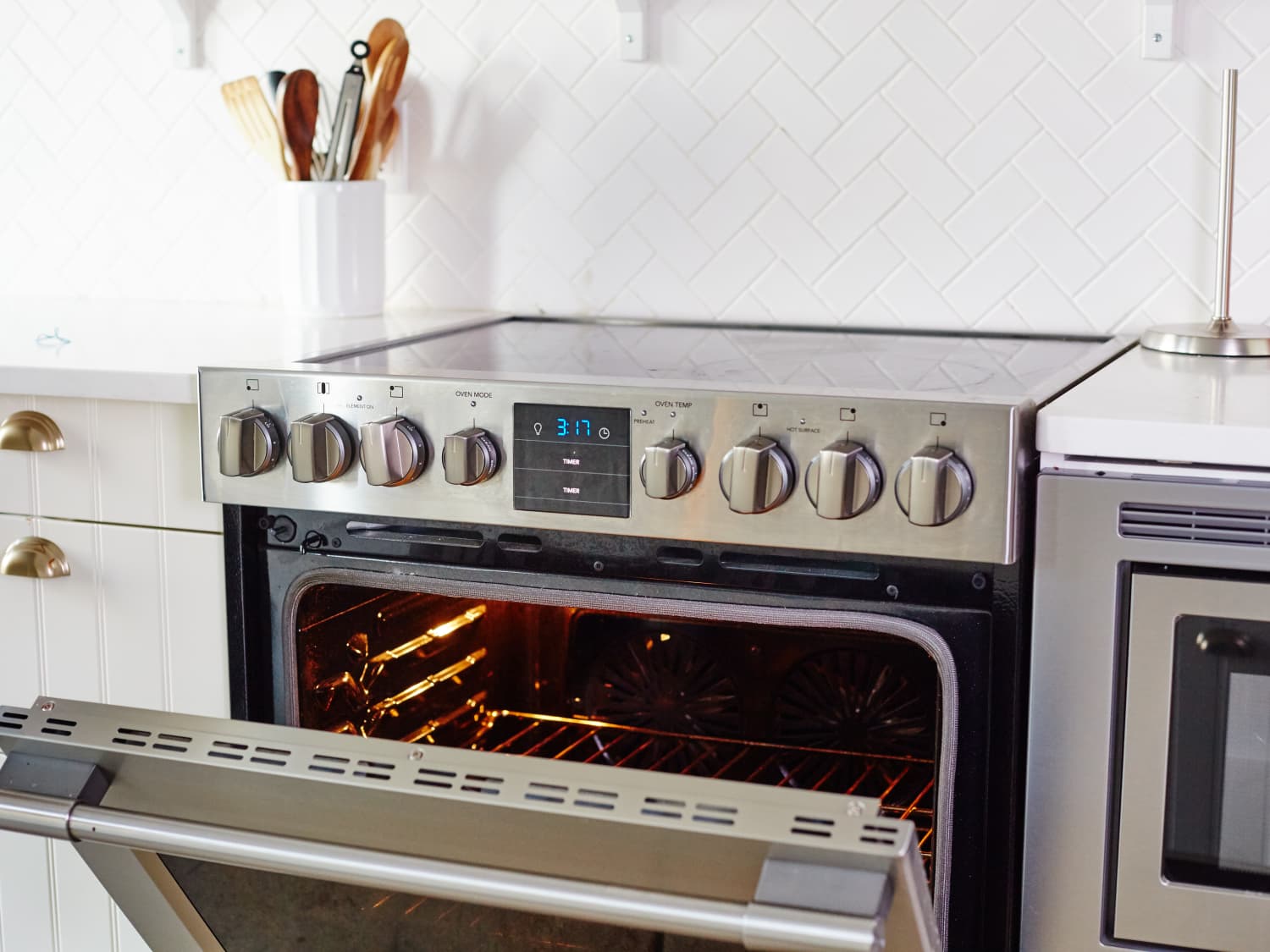 Can i use my oven to heat my house online