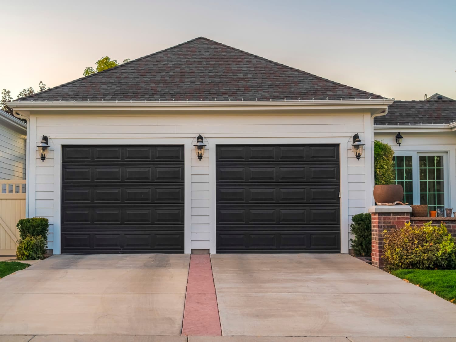 Black garage 2025 door white house