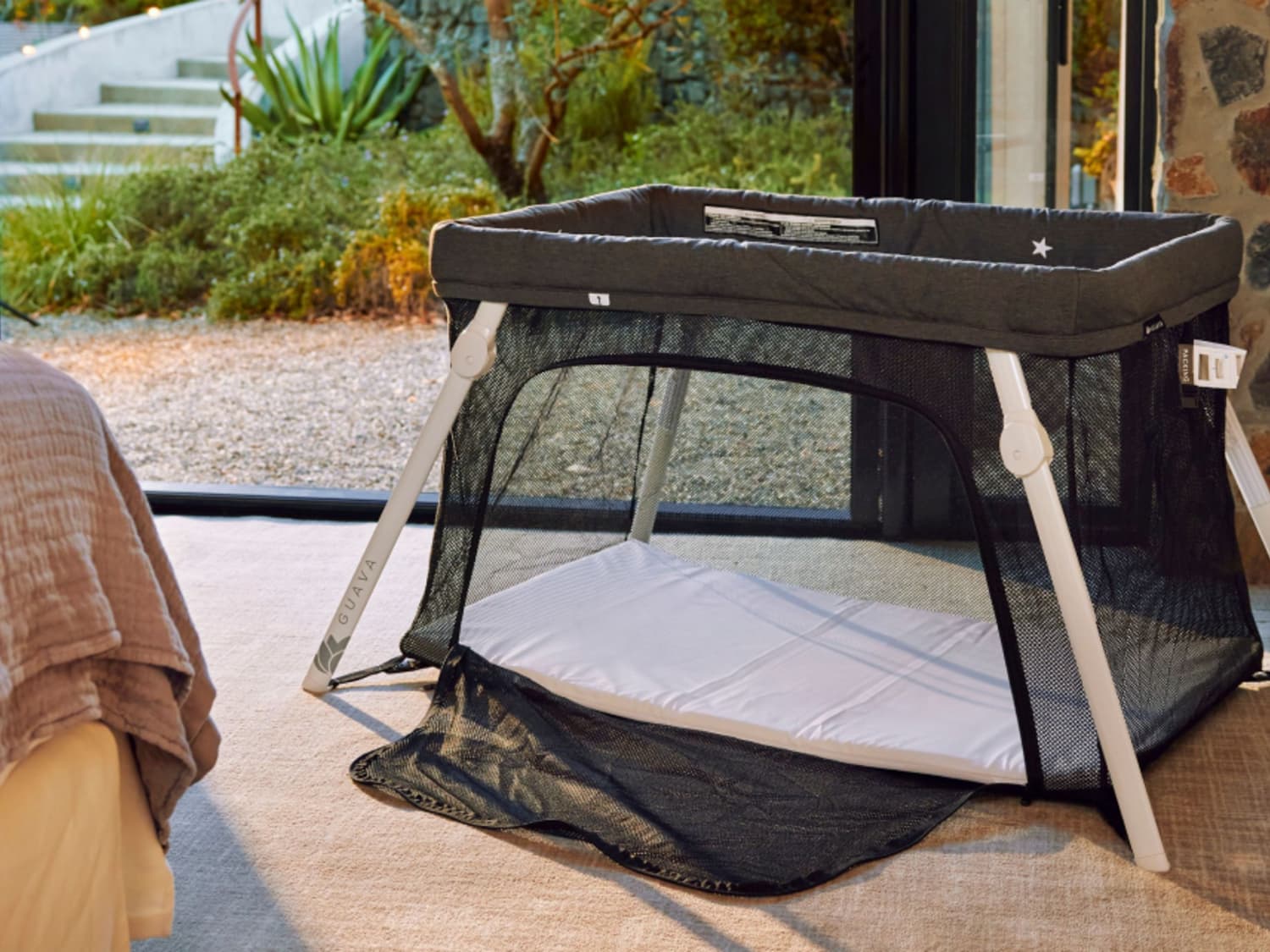 Guava Lotus Travel Crib Review Cubby