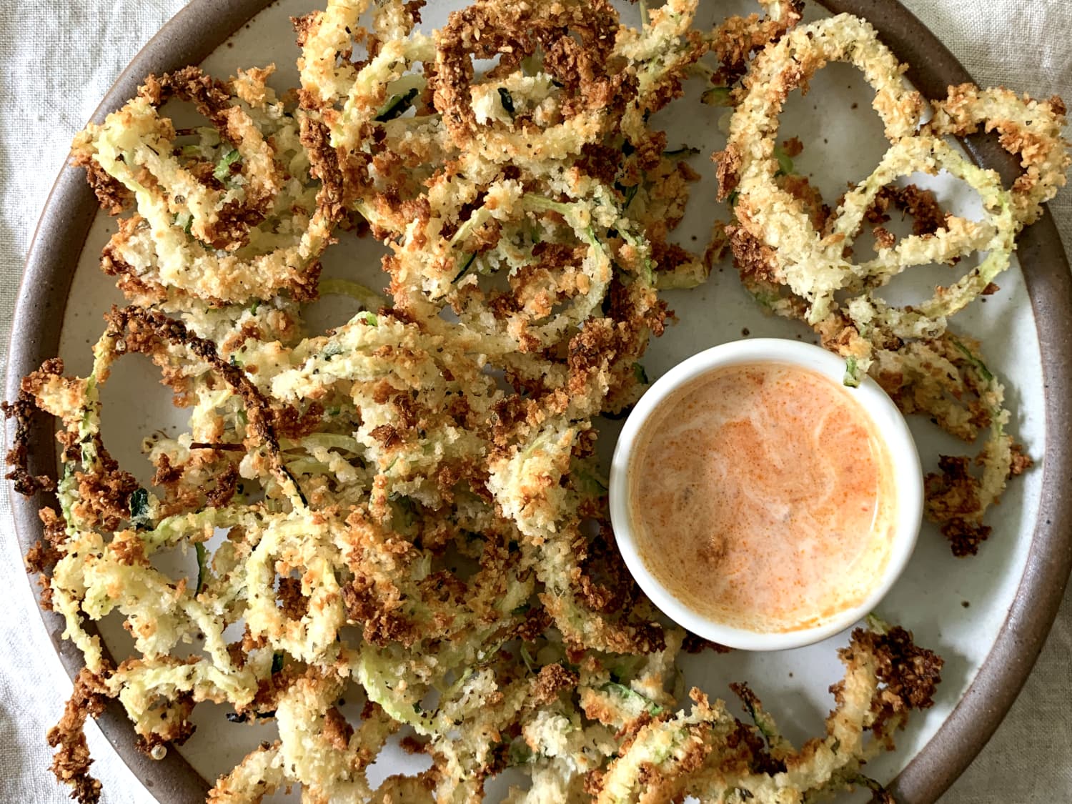 https://cdn.apartmenttherapy.info/image/upload/f_jpg,q_auto:eco,c_fill,g_auto,w_1500,ar_4:3/k%2FEdit%2F05-2021-I-Tried-It-Eating-Well-Zucchini-Fries%2FFinals%2FIMG_4475-final