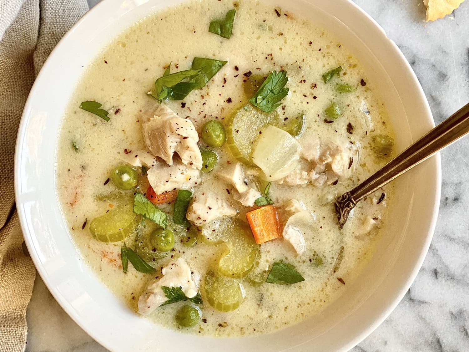 https://cdn.apartmenttherapy.info/image/upload/f_jpg,q_auto:eco,c_fill,g_auto,w_1500,ar_4:3/k%2FEdit%2F2023-01-Creamy-Chicken-Soup%2Fcreamy-chicken-soup-4