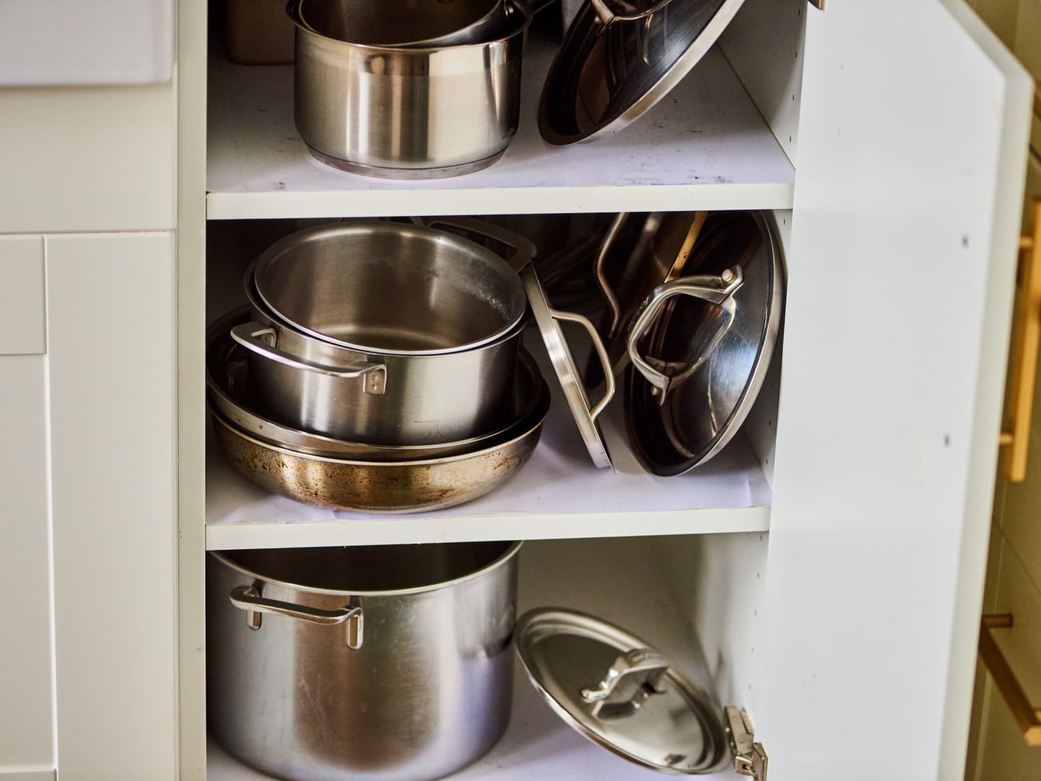 Five Ways to Get Your Pot Lids Organized  Diy kitchen storage, Kitchen  hacks organization, Kitchen storage
