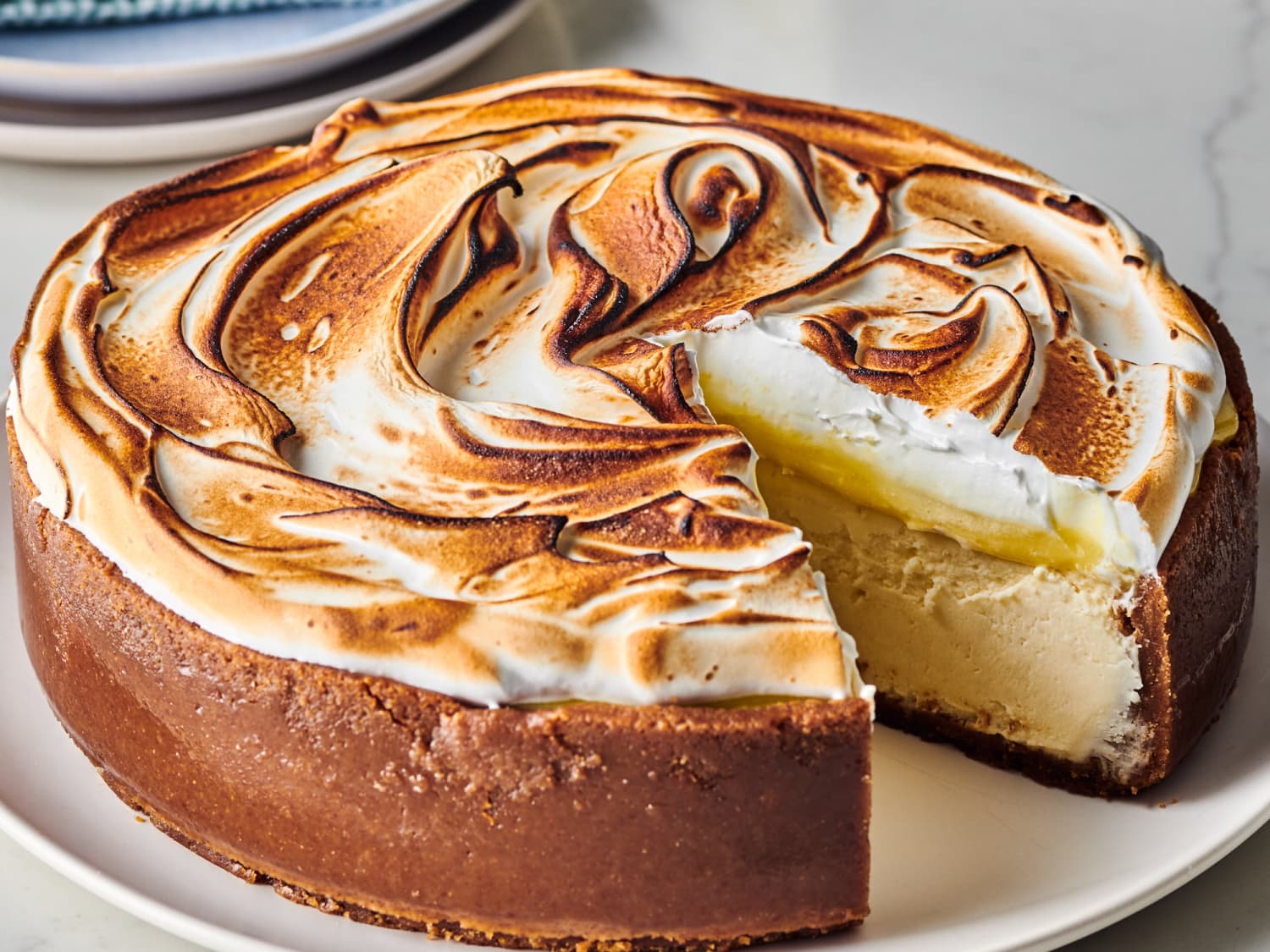 https://cdn.apartmenttherapy.info/image/upload/f_jpg,q_auto:eco,c_fill,g_auto,w_1500,ar_4:3/k%2FPhoto%2FRecipes%2F2020-12-most-wanted-lemon-meringue-cheesecake%2F2020-12-08_ATK_38719